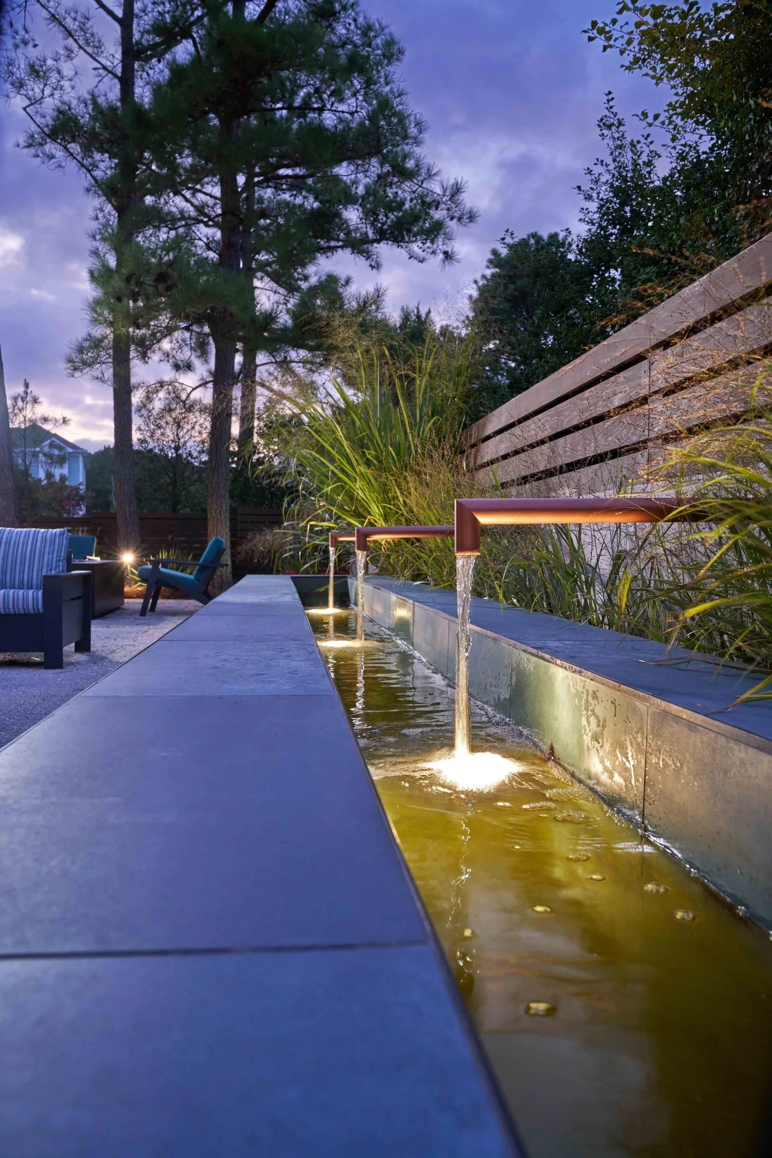 beach-garden-rehoboth-de-water-feature-night-lighting-kimmel-architects.webp