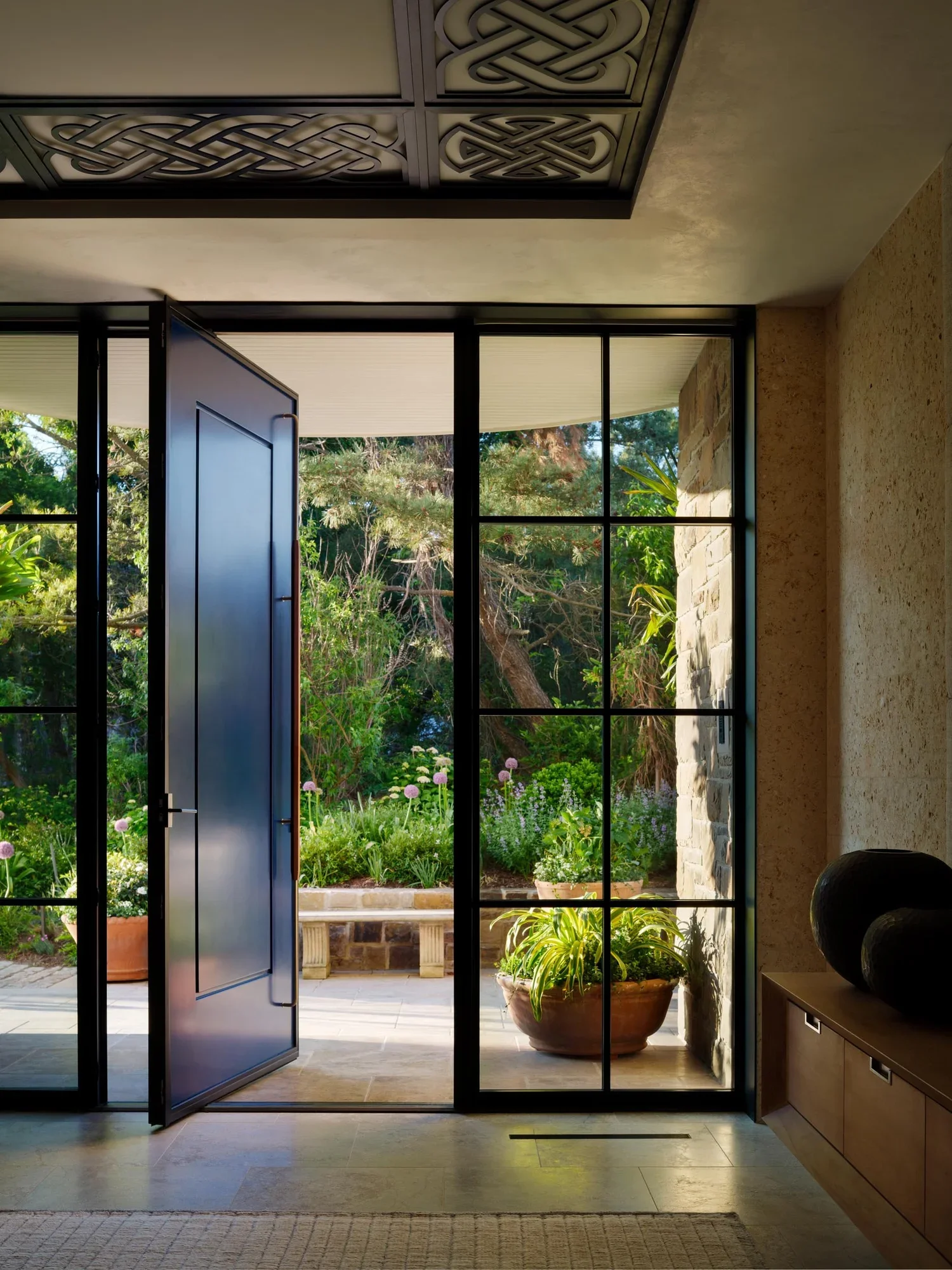 shingle-beach-house-coastal-steel-glass-entry-door-rehoboth-de-kimmel-architects.webp