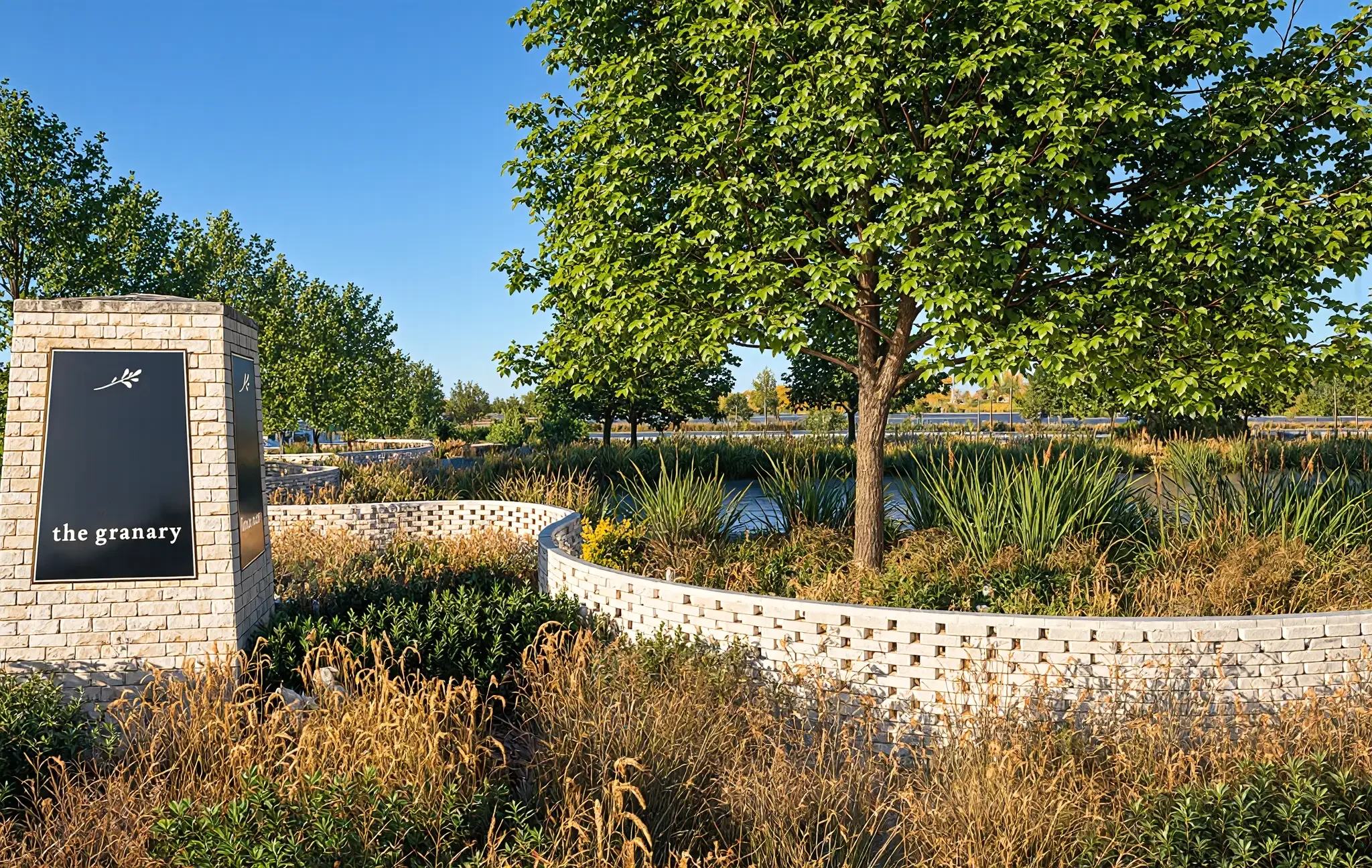 coastal-countryside-community-curved-brick-wall-landscaping-kimmel-studio.webp