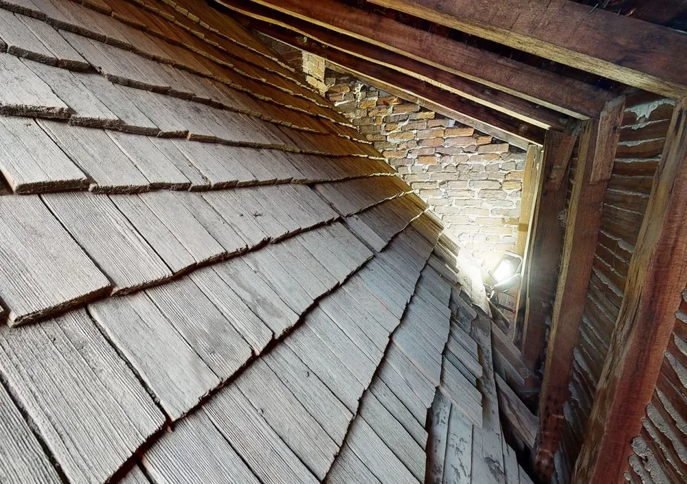 historic-preservation-process-cloverfields-historic-roof-shingles-kimmel-architects.webp