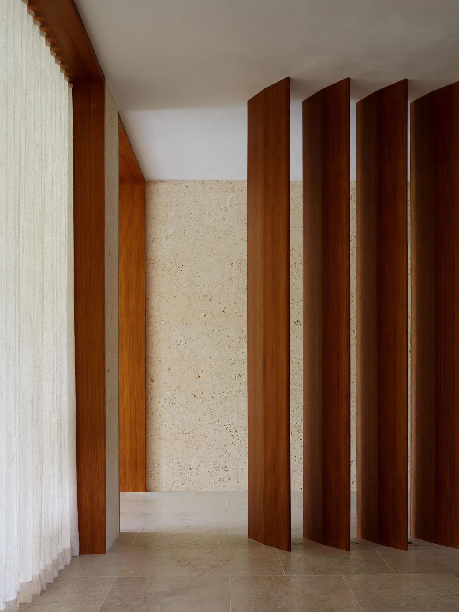 shingle-beach-house-coastal-wood-panel-screen-detail-rehoboth-de-kimmel-architects.webp