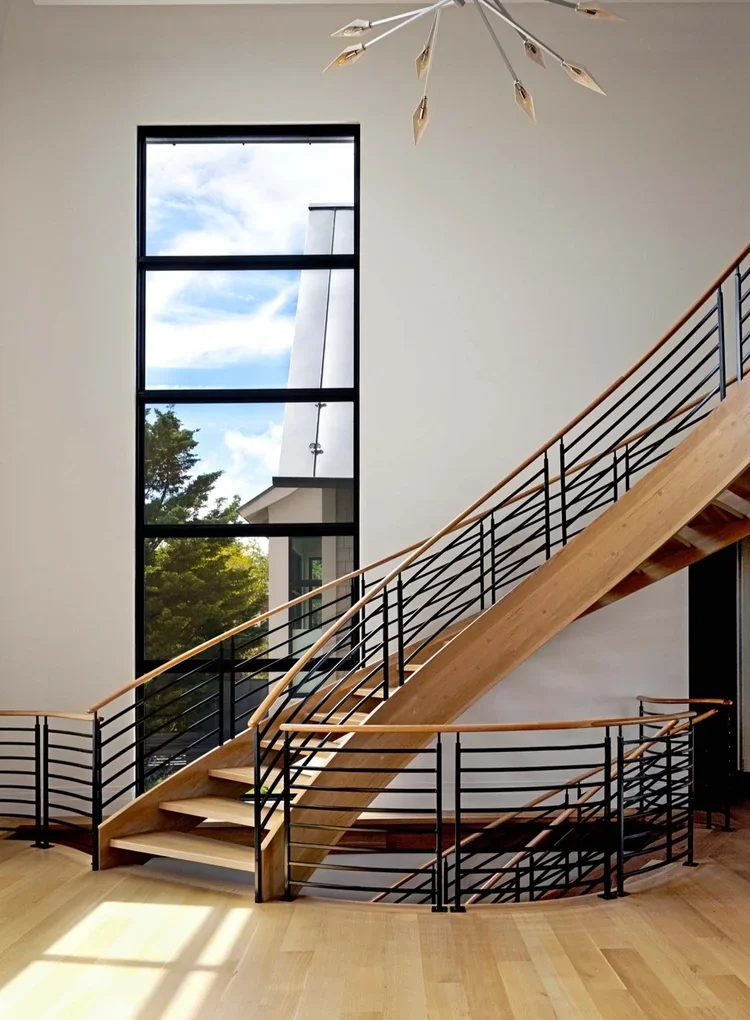 tidewater-modern-house-unique-wood-staircase-interior-design-annapolis-md-kimmel-architects.webp