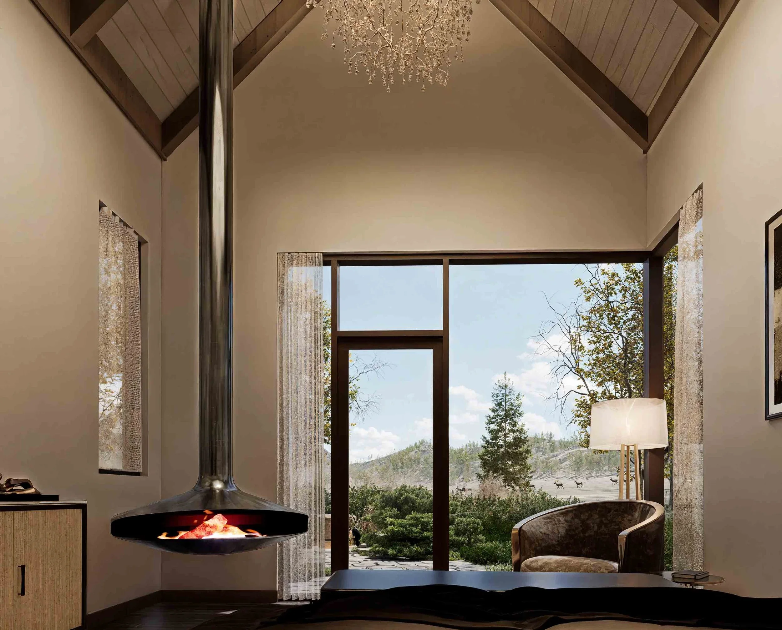 modern-mountain-courtyard-modern-floating-fireplace-lounge-carbondale-co-kimmel-architects.webp