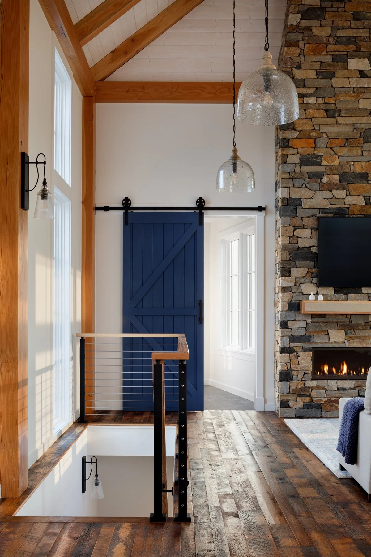 modern-mountain-farmhouse-blue-sliding-barn-door-free-union-va-kimmel-architects.jpg