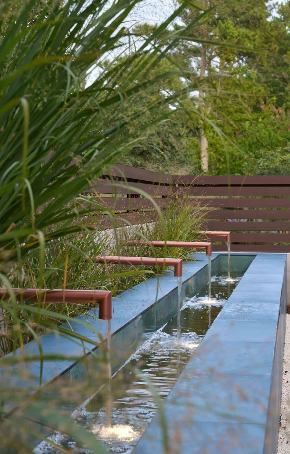 beach-garden-rehoboth-de-fountain-bronze-spouts-detail-kimmel-architects.webp