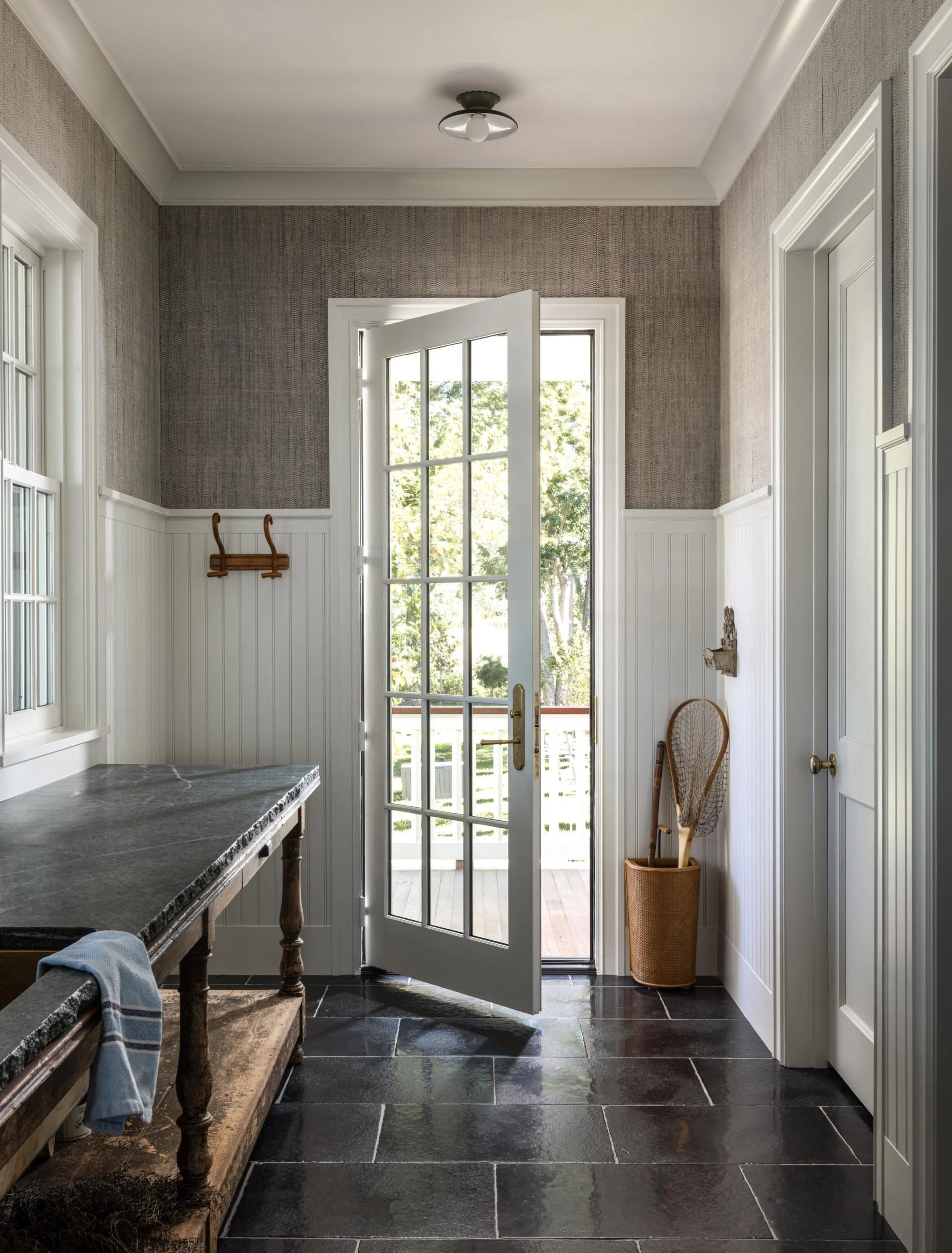 mudroom-entry-with-slate-floor-and-french-door-kimmel-studio-architects.jpg
