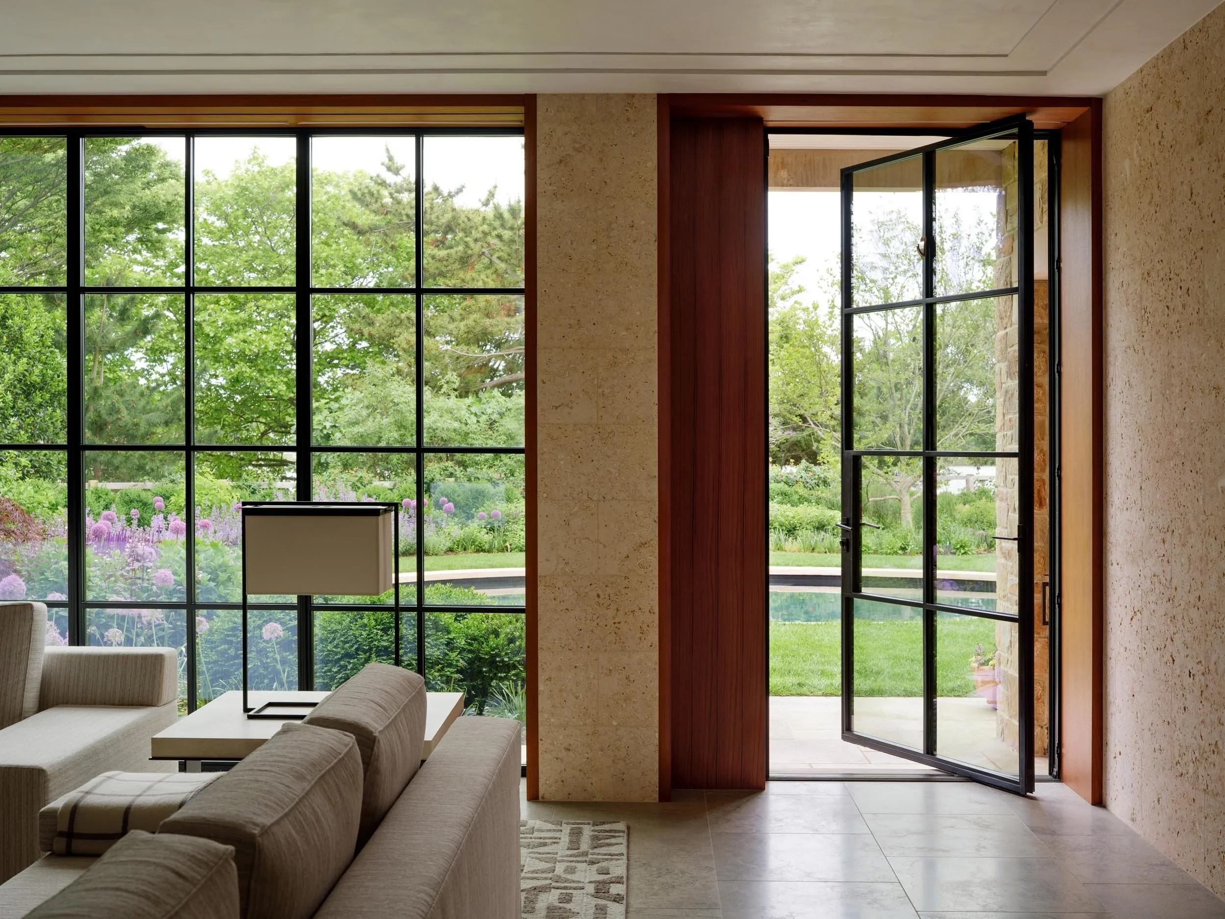 shingle-beach-house-coastal-steel-glass-sliding-doors-rehoboth-de-kimmel-architects.webp