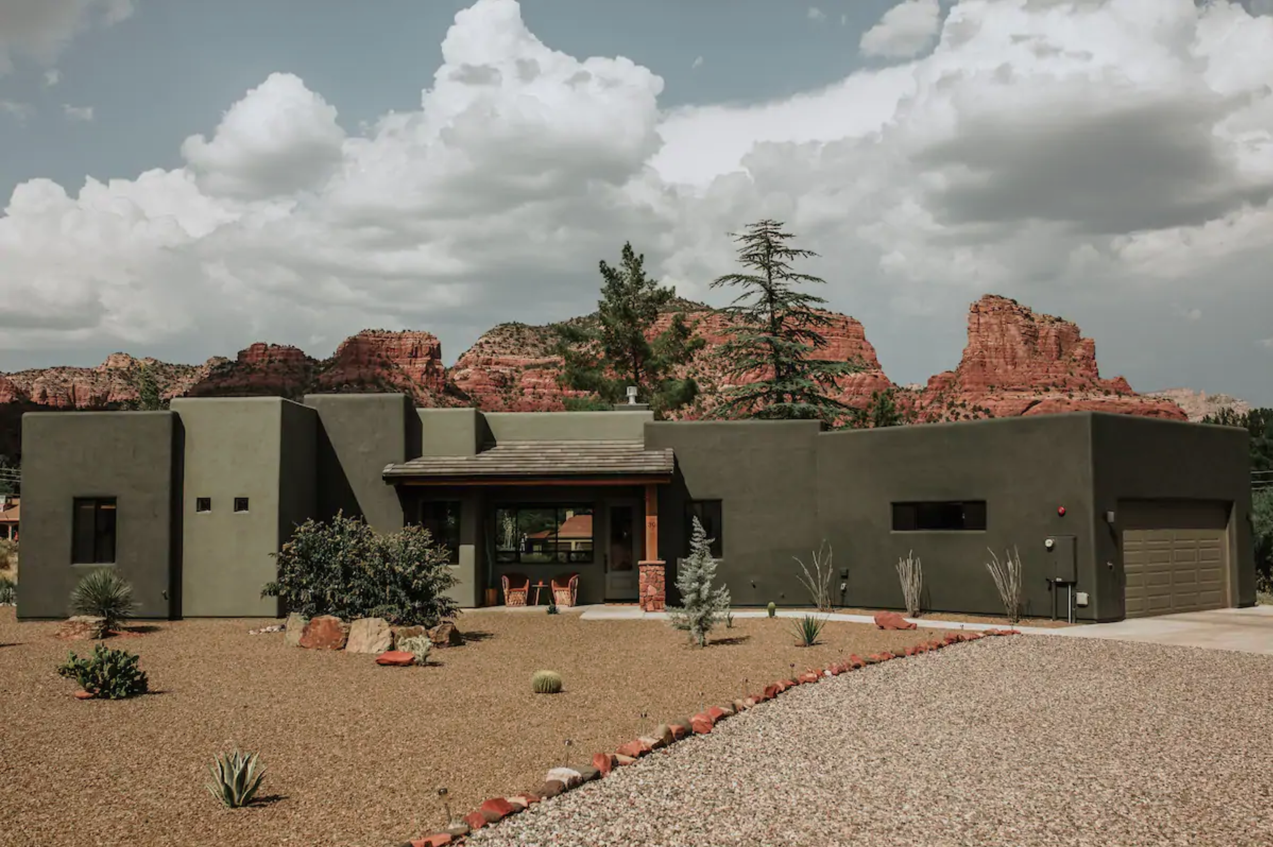 Adobe Style home exterior with big red rock mountain views
