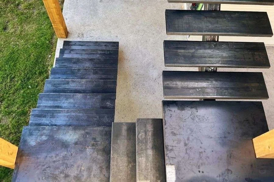 Top-down view of industrial metal stairs for outdoor use.