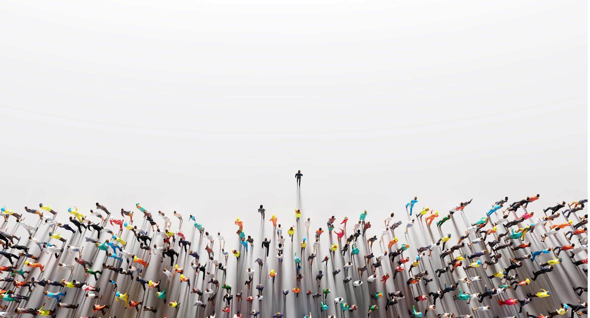 An aerial view of a large group of diverse people standing in a crowd on a white background, with two individuals standing apart from the crowd in the middle.