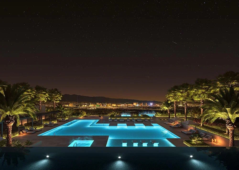 Night view of a luxurious Four Seasons Private Residences outdoor pool area with palm trees, lounge chairs, and cityscape in the background under a starry sky.