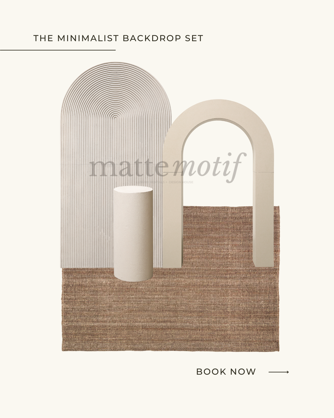 Minimalist backdrop set with arched panels, a cylindrical stand, and a textured brown rug.