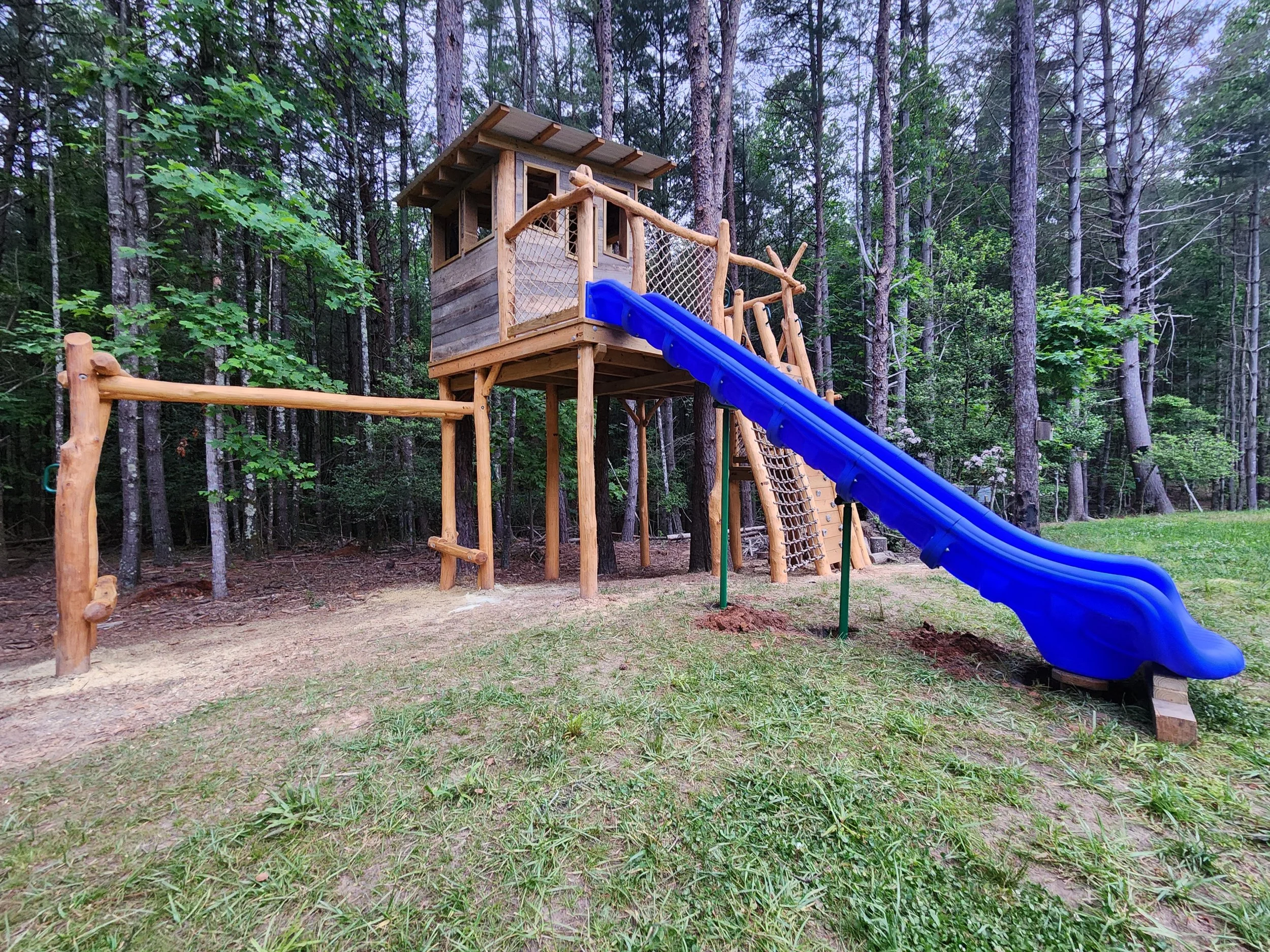 cottage-park-morganton-nc-custom-black-locust-playground-treehouse-slide-001.jpeg