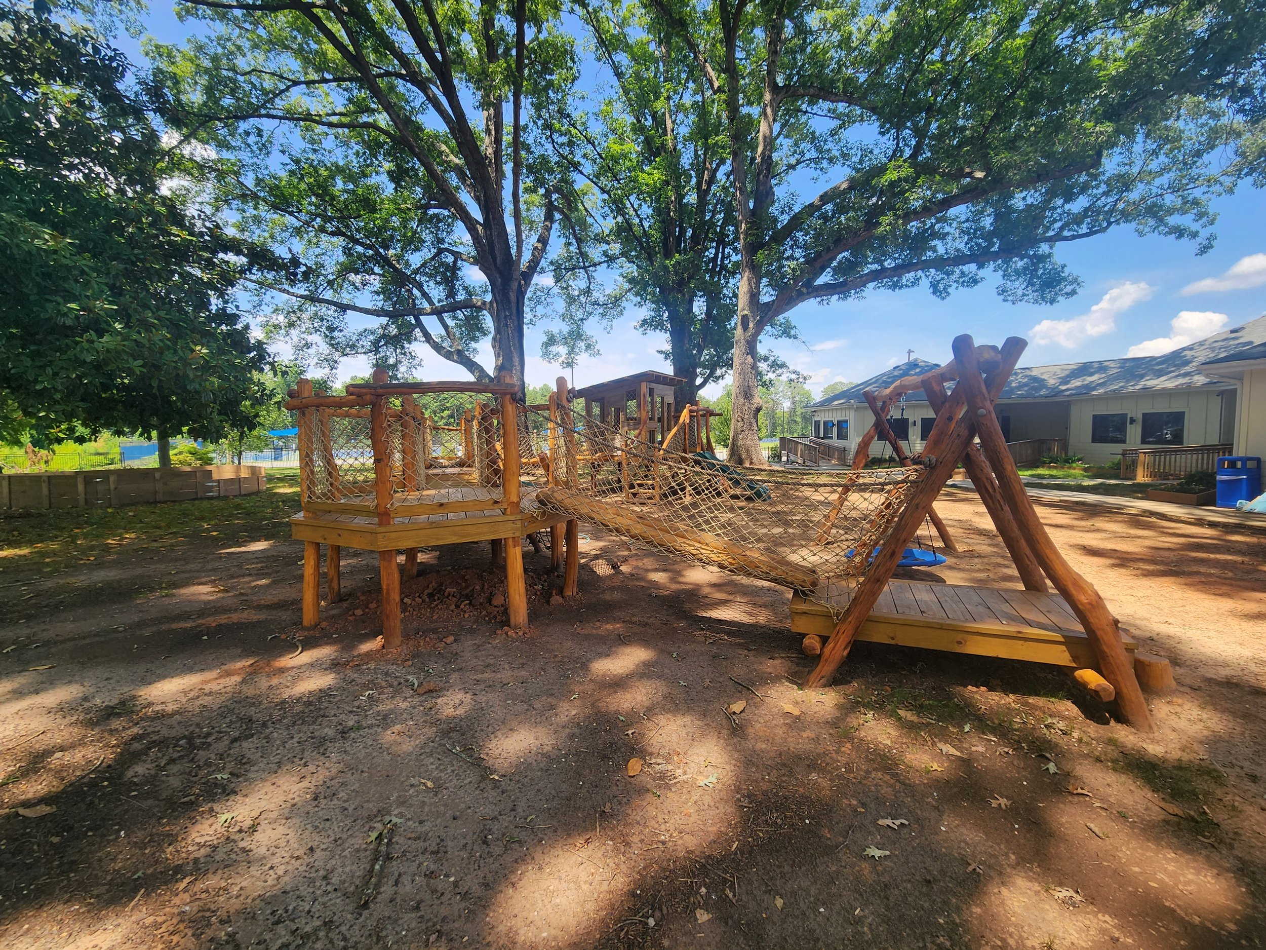 davidson-nc-custom-black-locust-playground-treehouse-overview-002.jpeg