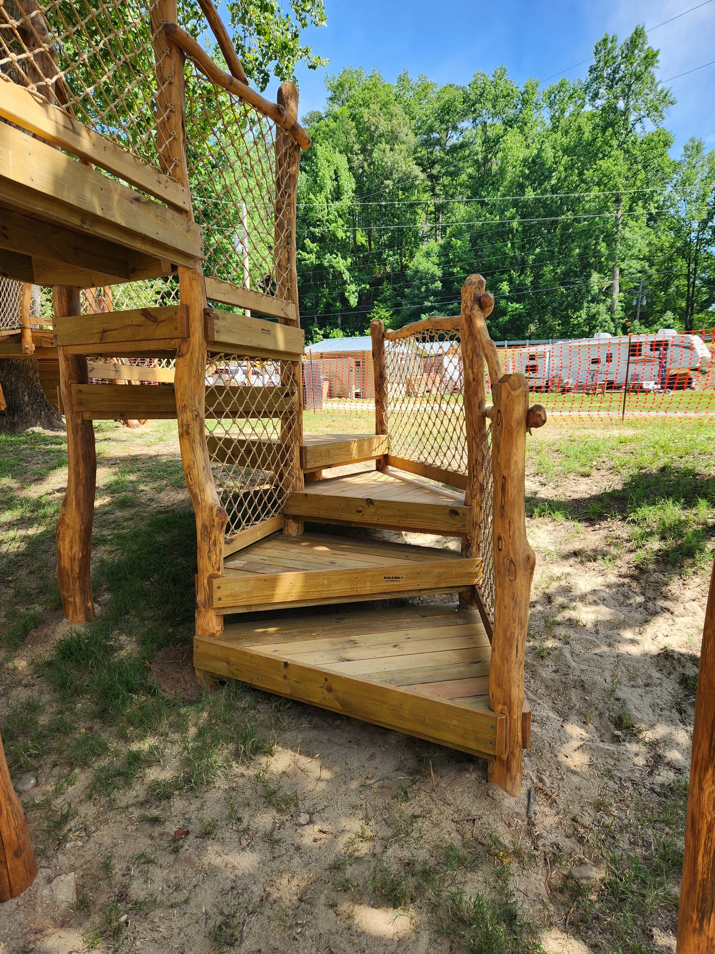 morganton-nc-horseshoe-bend-family-campground-custom-black-locust-playground-treehouse-landings-000.jpg