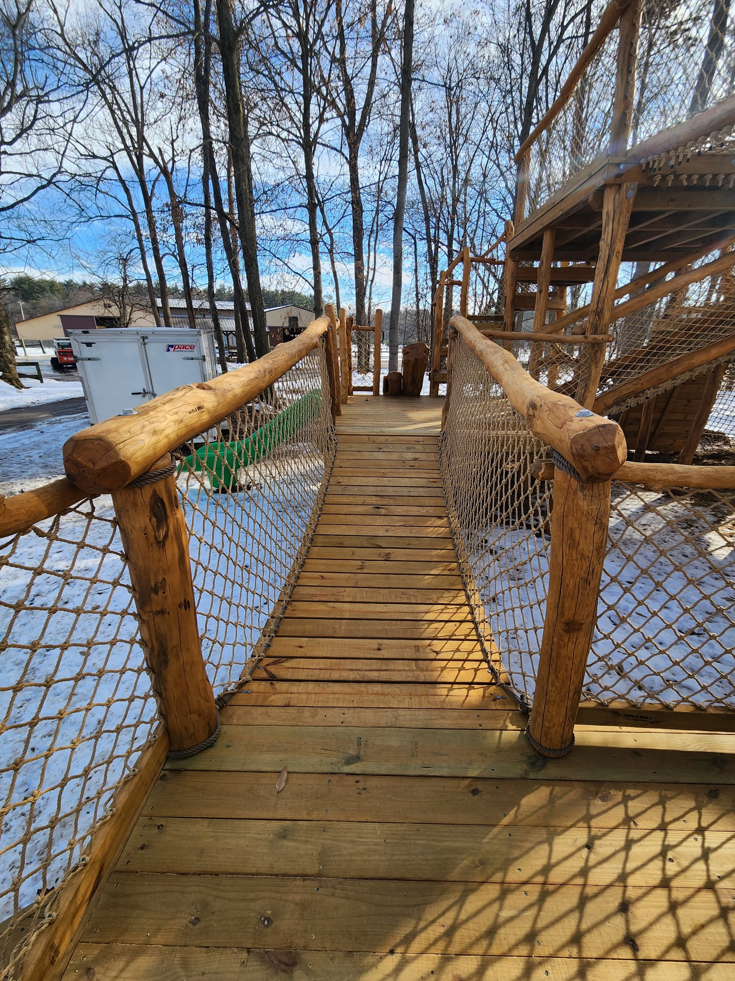 lafayette-in-custom-black-locust-playground-treehouse-suspension-bridge-000.jpg