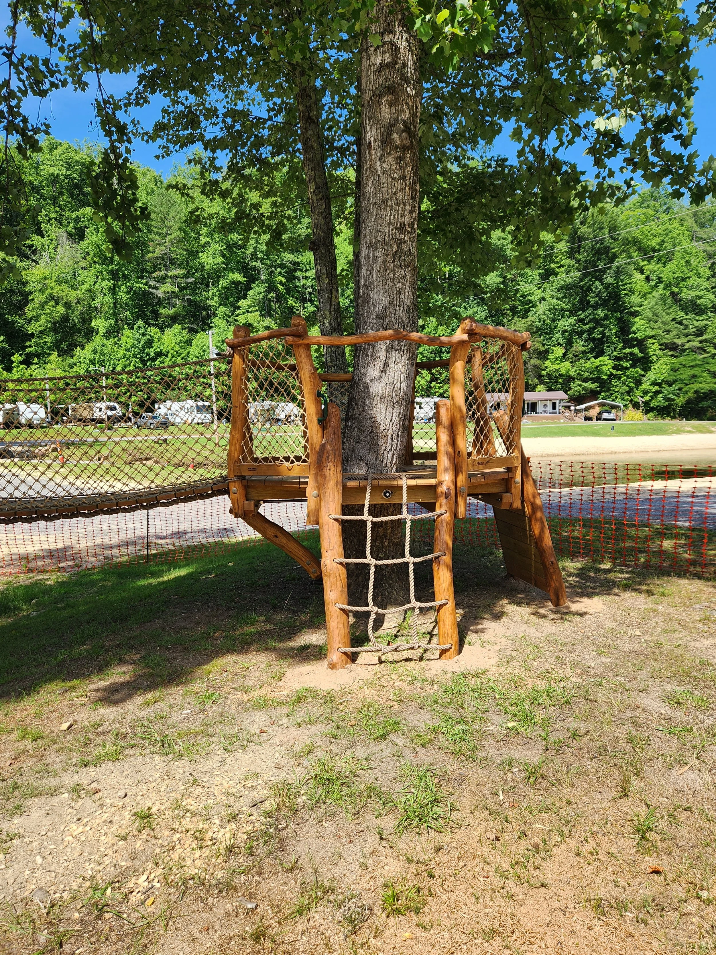 morganton-nc-horseshoe-bend-family-campground-custom-black-locust-playground-treehouse-cargo-net-000.jpg