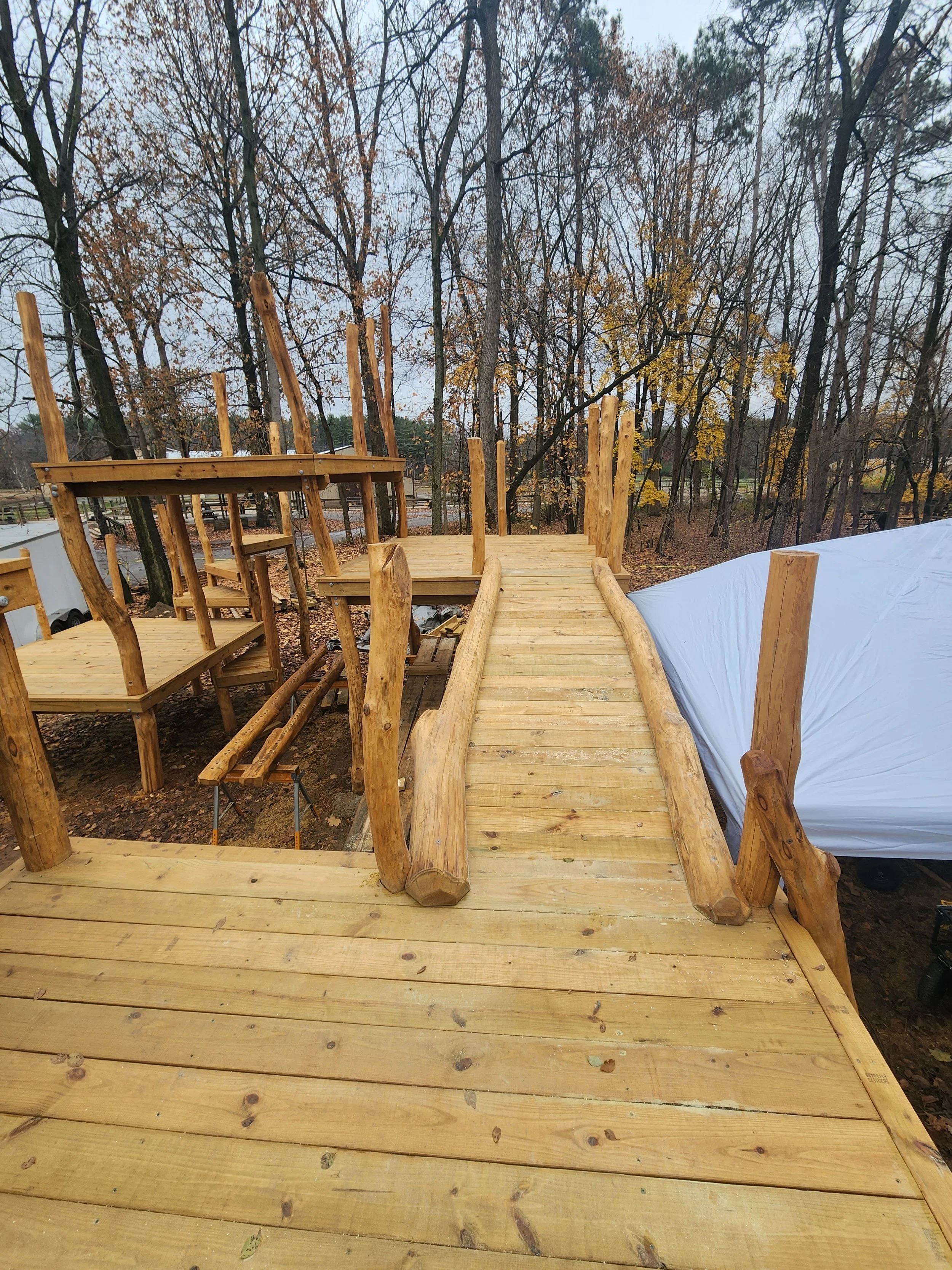 lafayette-in-custom-black-locust-playground-treehouse-overview-001.jpg