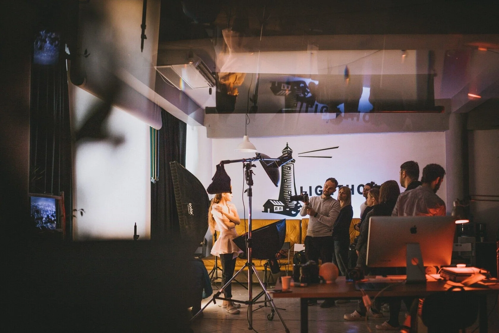 Photography_studio_with_models_and_crew_in_modern_setting.jpeg