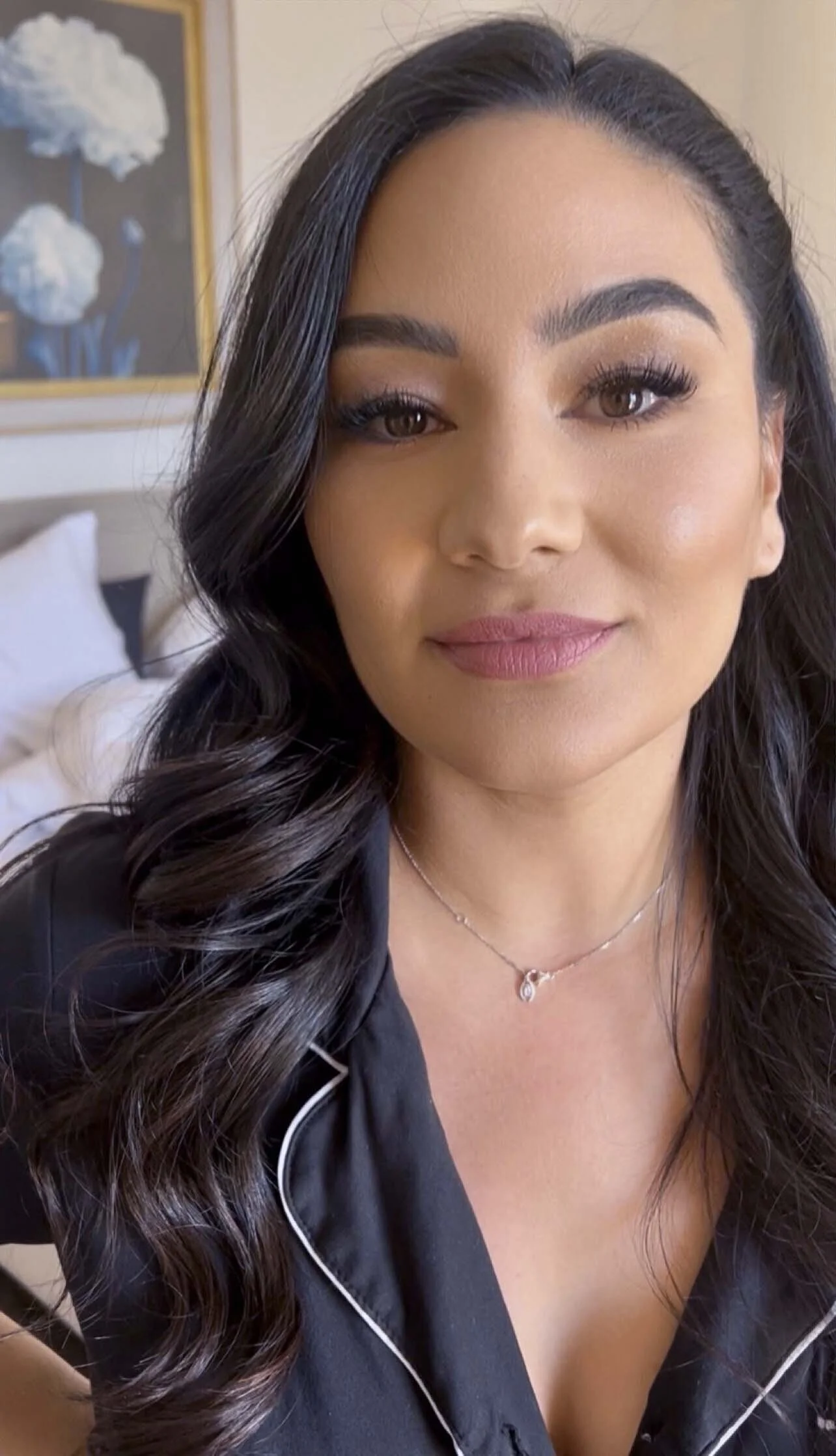 Woman_in_Black_Pajamas_with_Long_Hair_and_Necklace.jpg