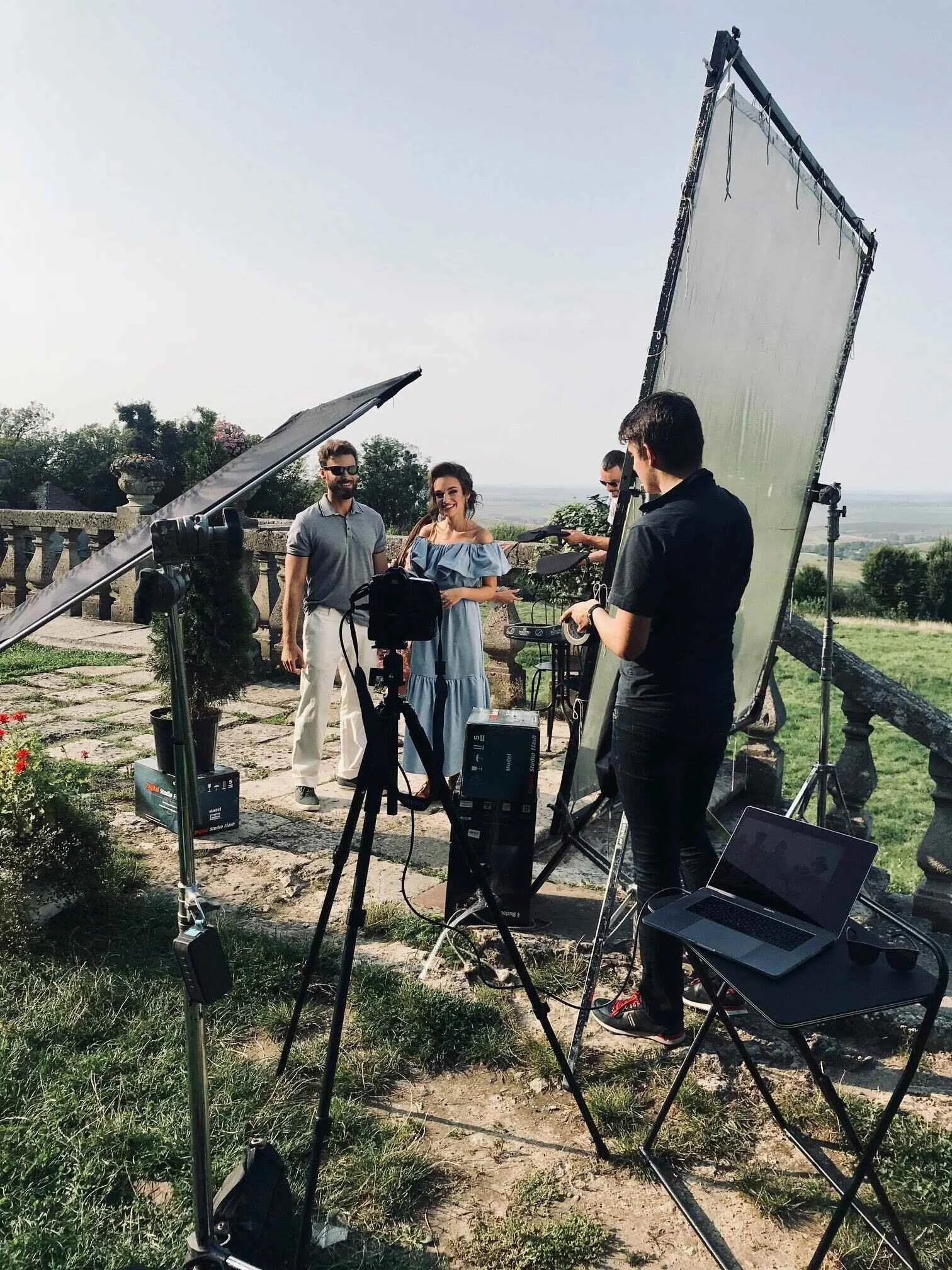 Outdoor_photo_shoot_with_models_and_equipment.jpeg