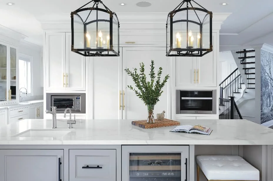 small-fridge-in-luxury-kitchen-island-and-white-cabinets-with-golden-trim-modern-kitchen-images.png