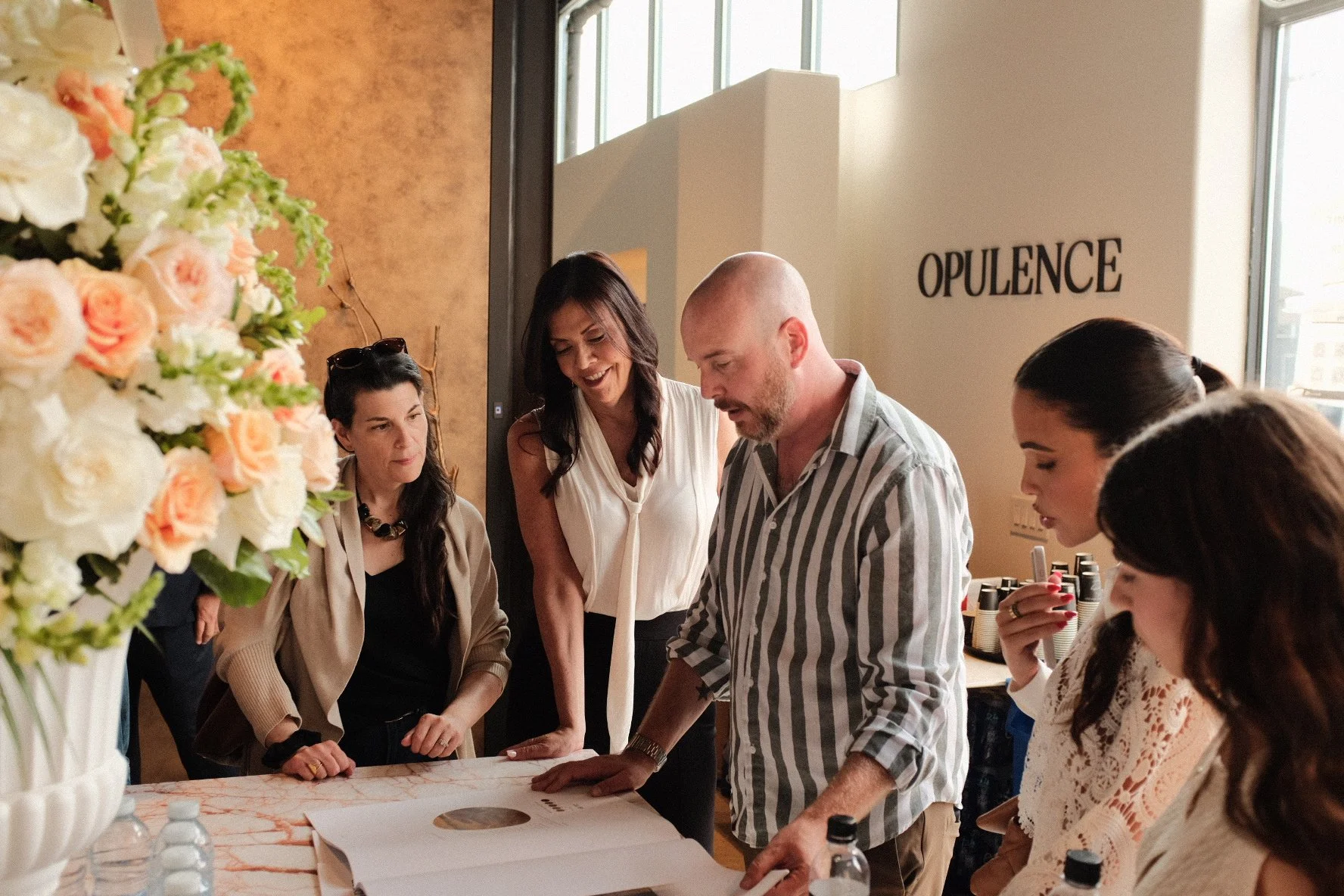 Joseph Gerofsky, Director of Opulence Architectural Systems, Marla Baker, Founder of Marla Baker.ca (white blouse), and Laura Stein of Laura Stein Interiors