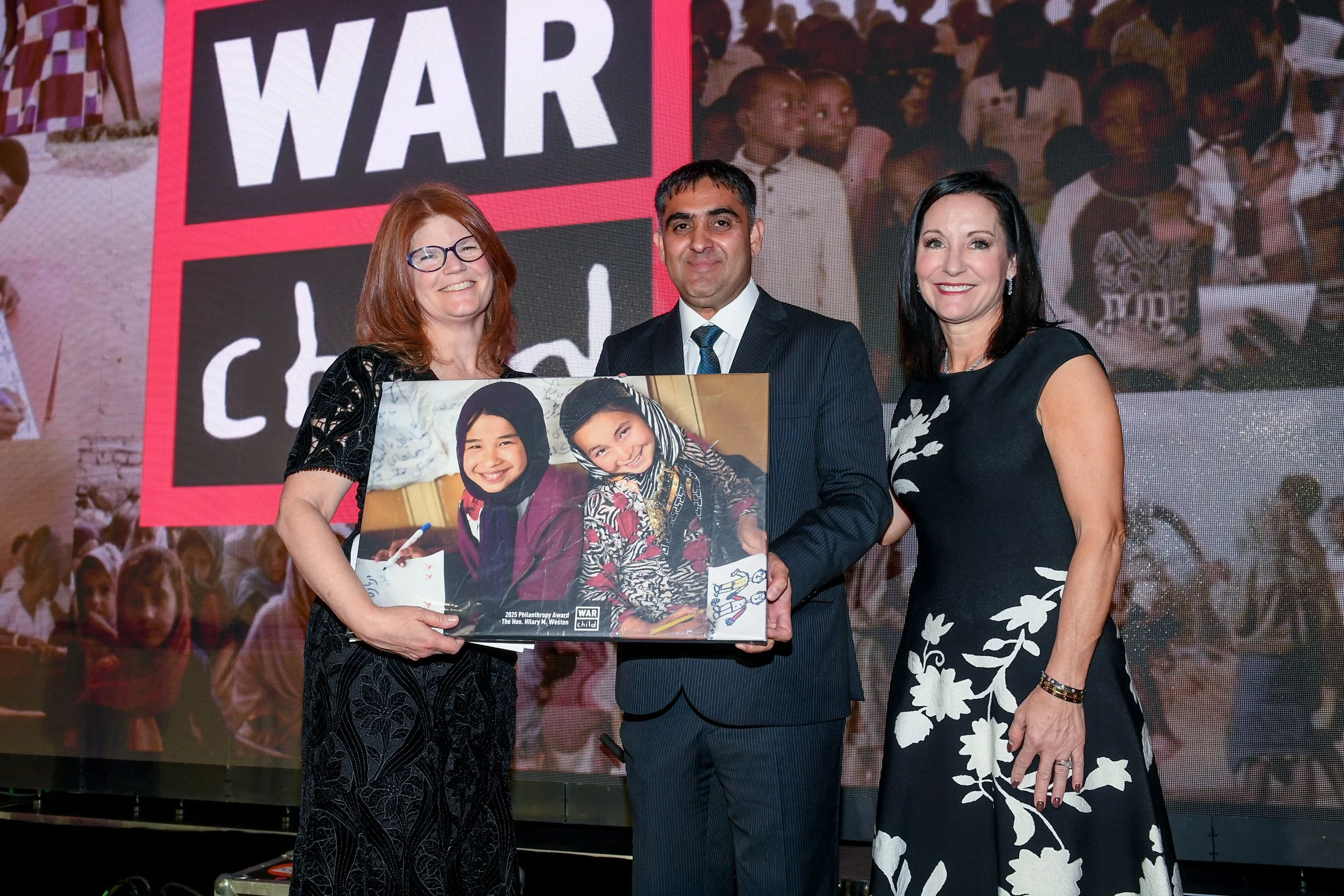 Amy Buskir, W Mujaddidi, Adrain Lang