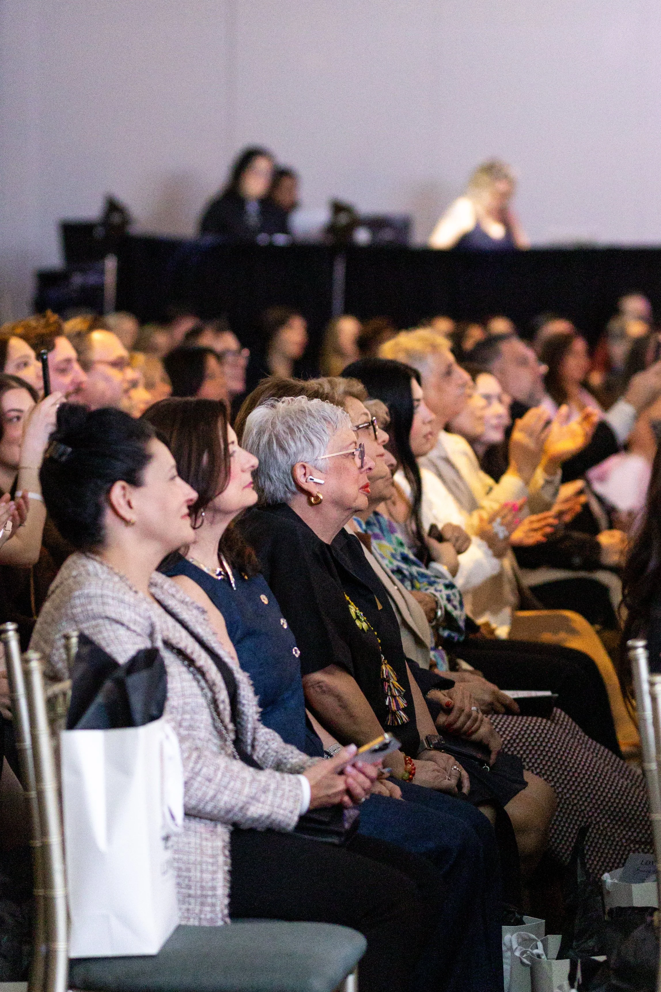 Guests watching the fashion show 