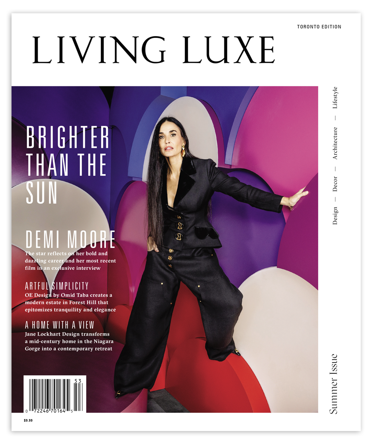 Cover of Living Luxe magazine featuring Demi Moore in a black suit, posing against a colorful backdrop of large, abstract shapes.