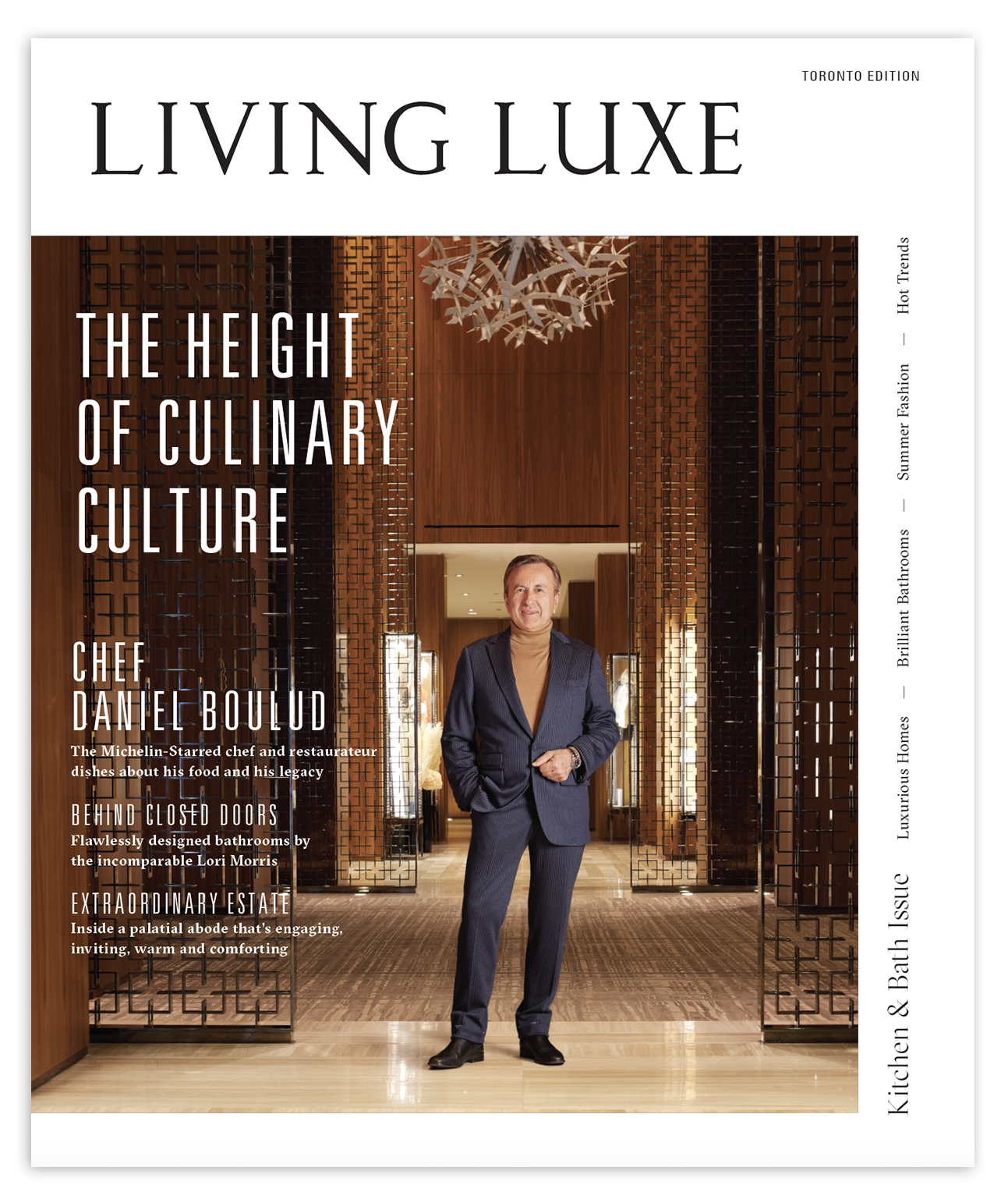 Cover of Living Luxe magazine featuring chef Daniel Boulud standing in a luxurious interior with wooden accents and modern lighting.
