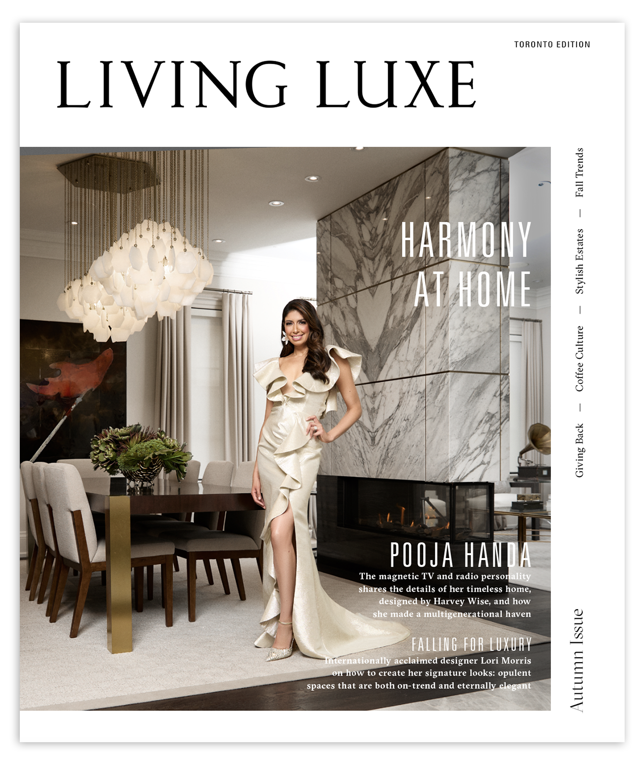 A woman in an elegant, cream-colored dress with ruffles standing in a luxurious modern living room with a marble fireplace, dining area, chandelier, and decor. Cover of Living Luxe magazine, Toronto edition, Fall issue.