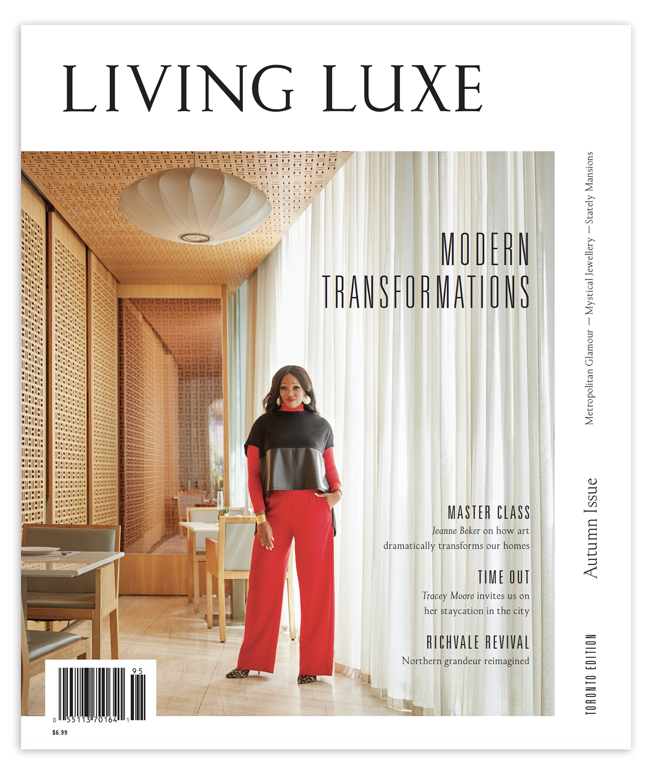 Cover of Living Luxe magazine featuring chef Daniel Boulud standing in a luxurious interior with wooden accents and modern lighting.