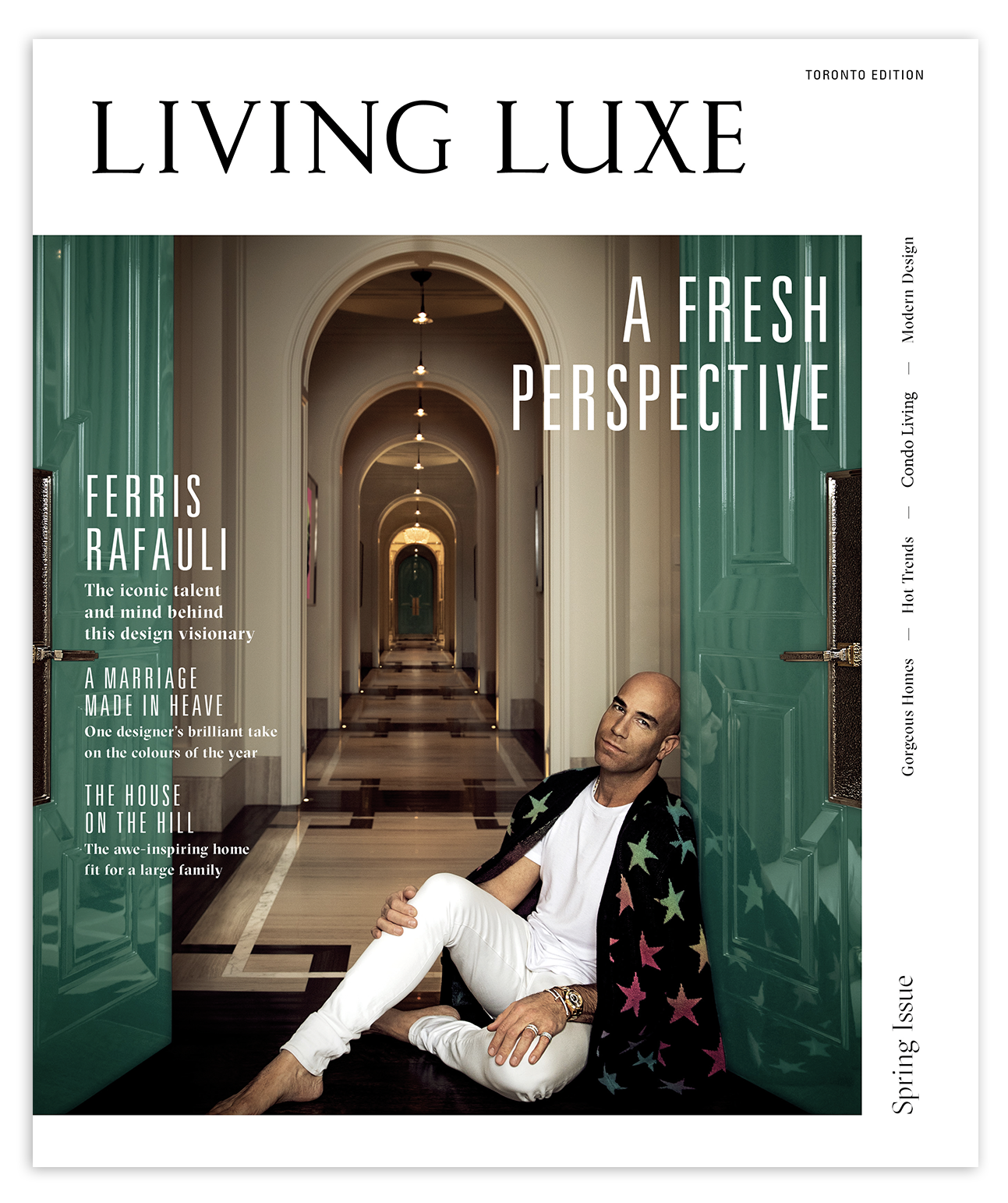 Cover of Living Luxe magazine featuring a woman in a pink dress and a man in a dark coat, standing in an elegant interior space with pink flowers on a table.