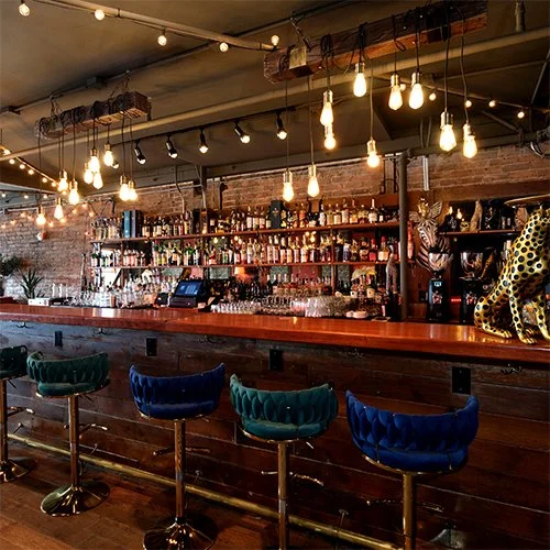 Fully stocked bar with imported liquors.