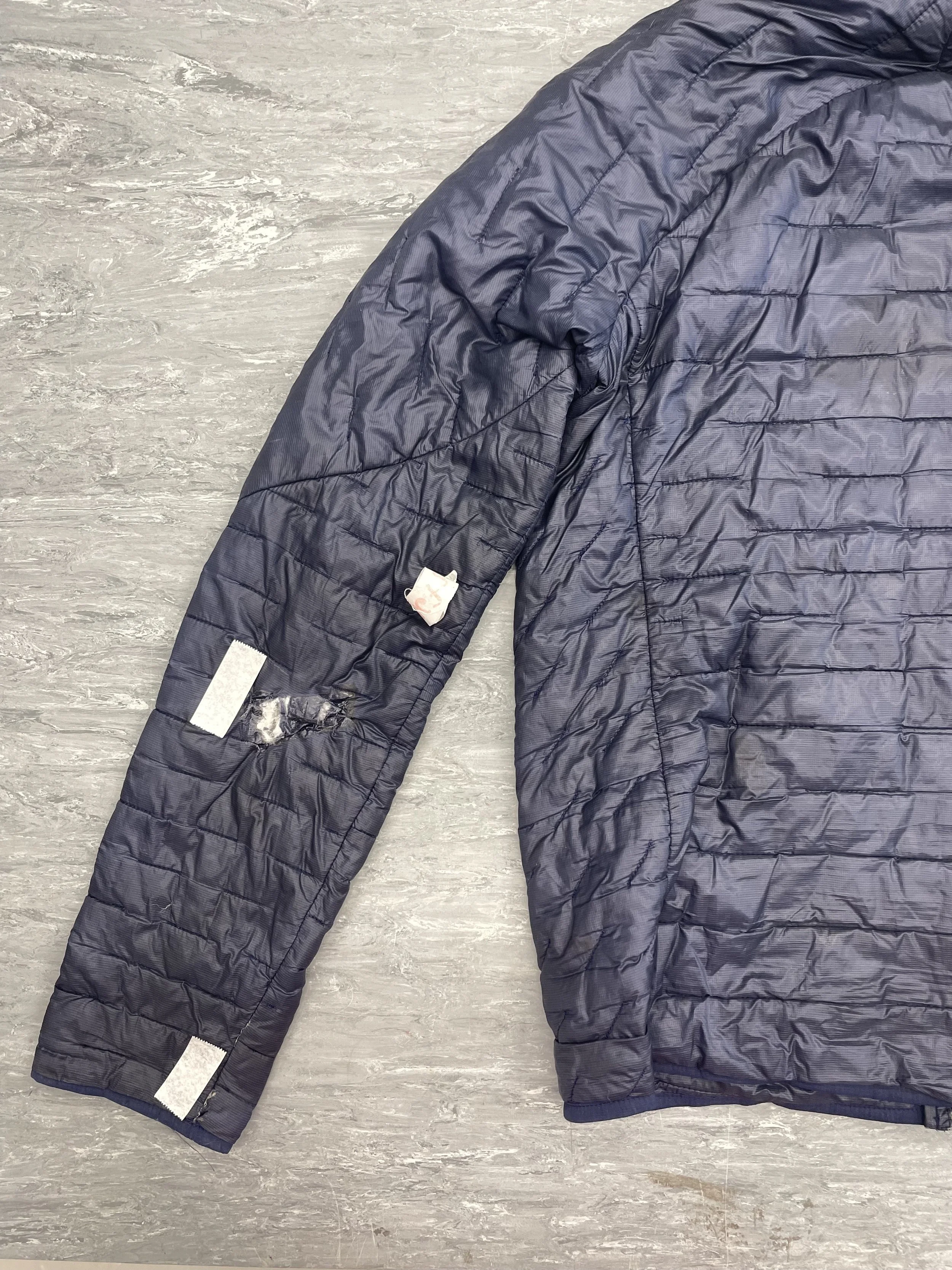 Lots of holes on coat sleeve