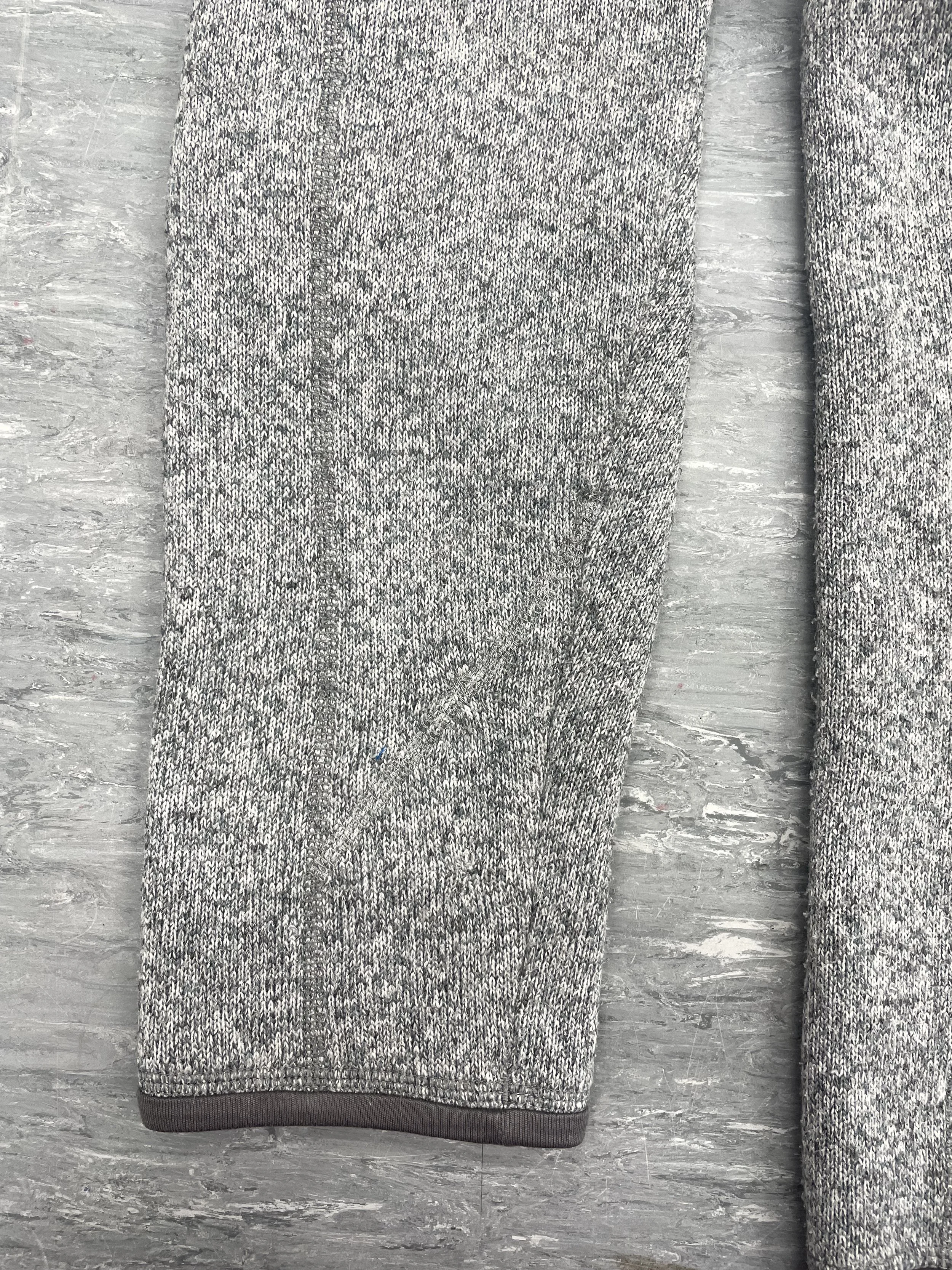 Hand sewn closed & then flatlocked with machine