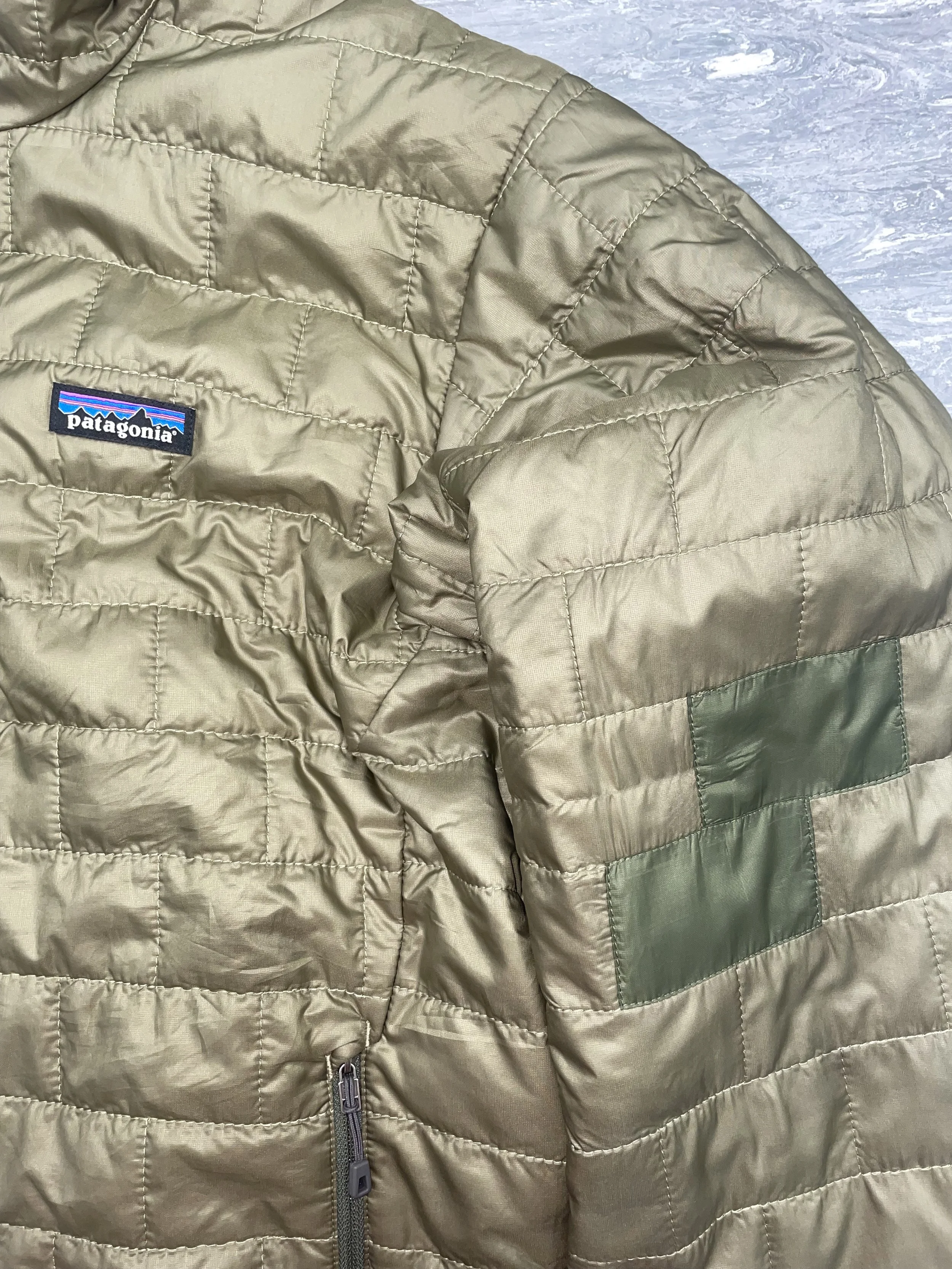 Patch repair applied along existing seam lines for a discreet finish 