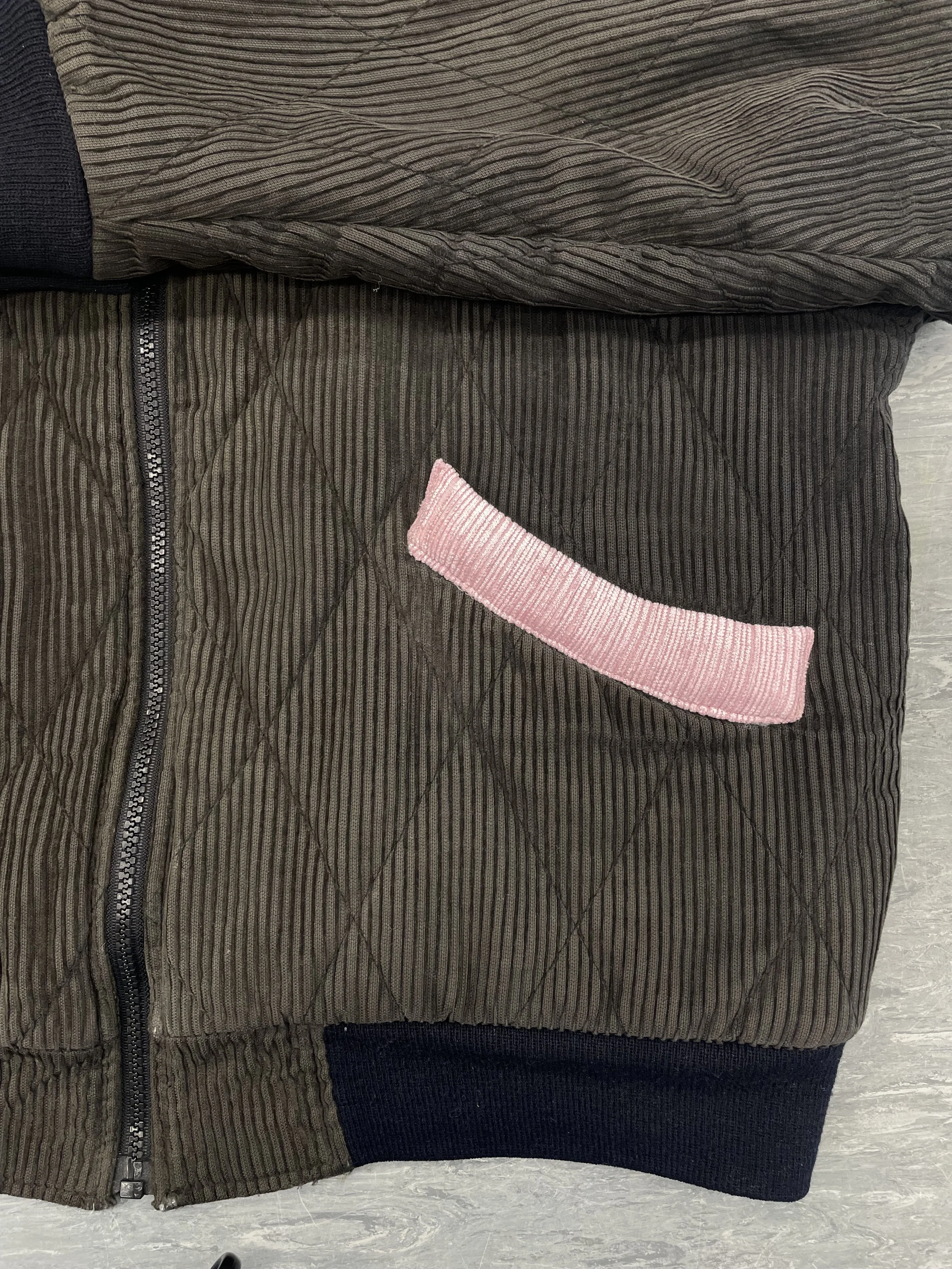 New fabric added to pocket & sleeve repaired