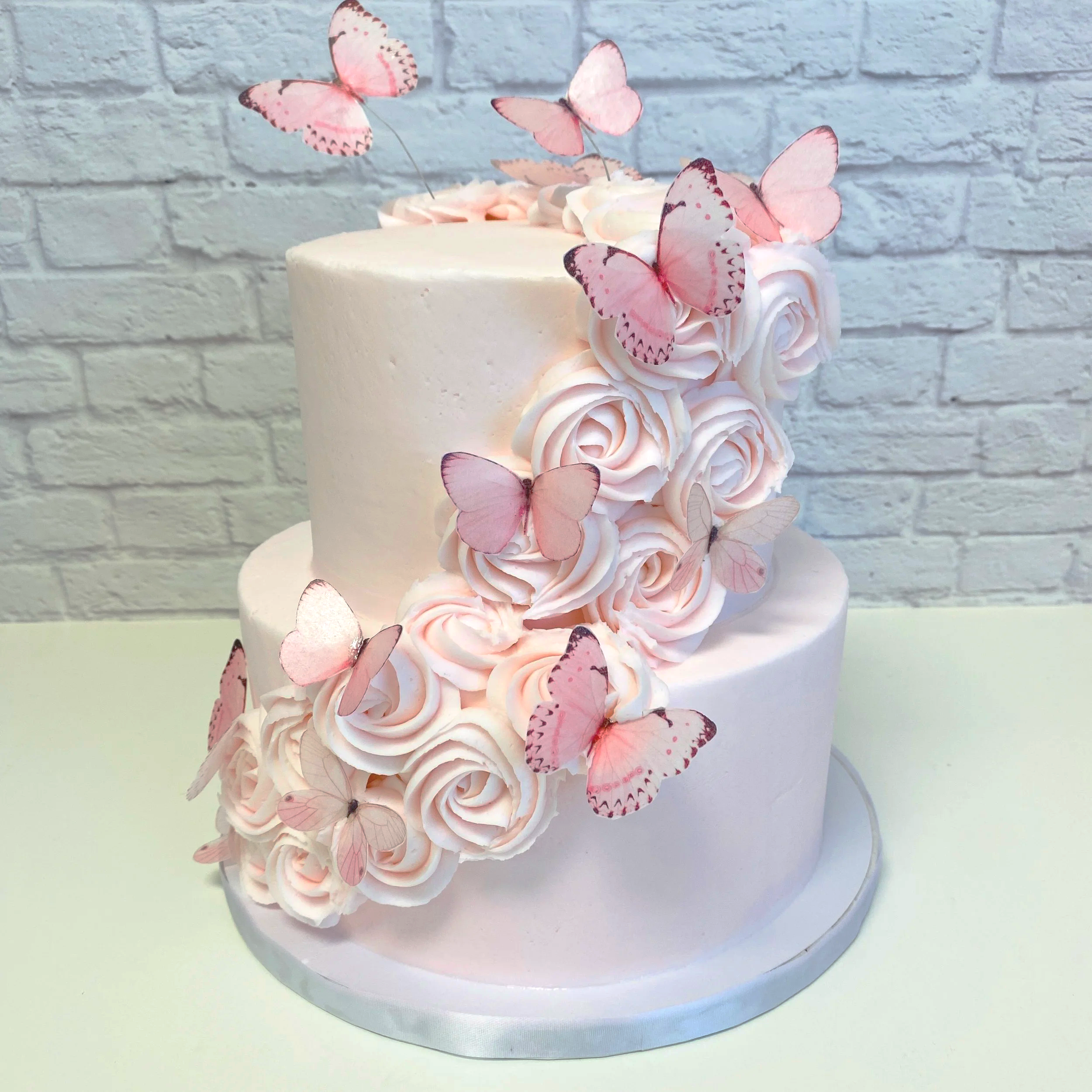 Buttercream cake with edible butterflies in El Paso, TX