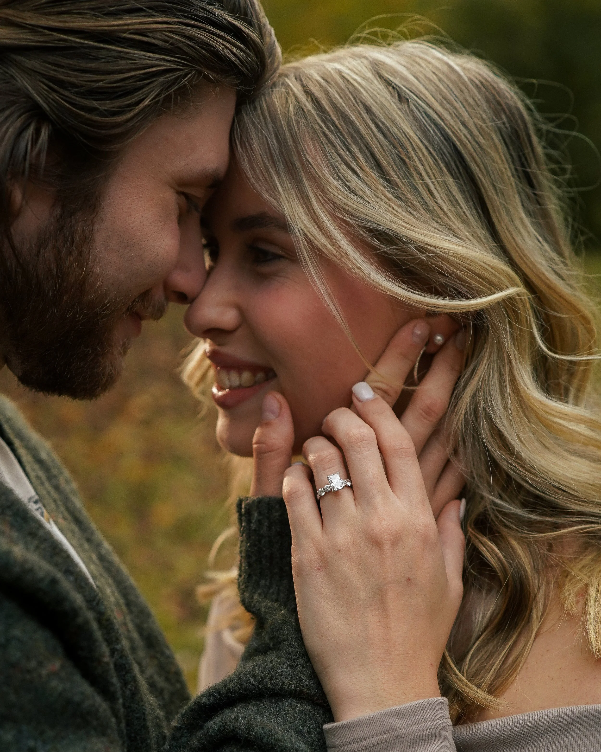 Close-up of couple’s hands with engagement ring in Hamilton, AL