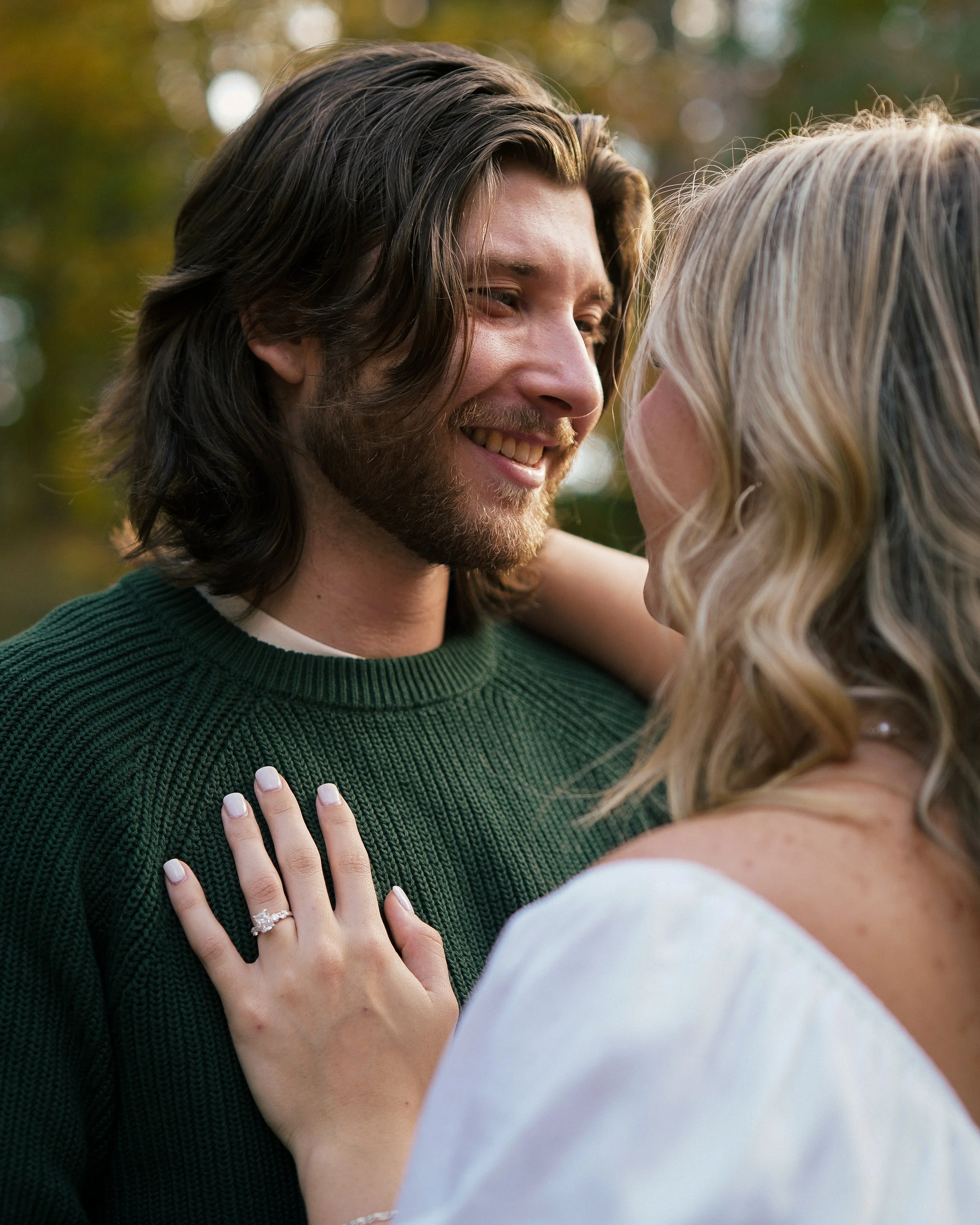 Engaged couple on walking trail in Hamilton, Alabama
