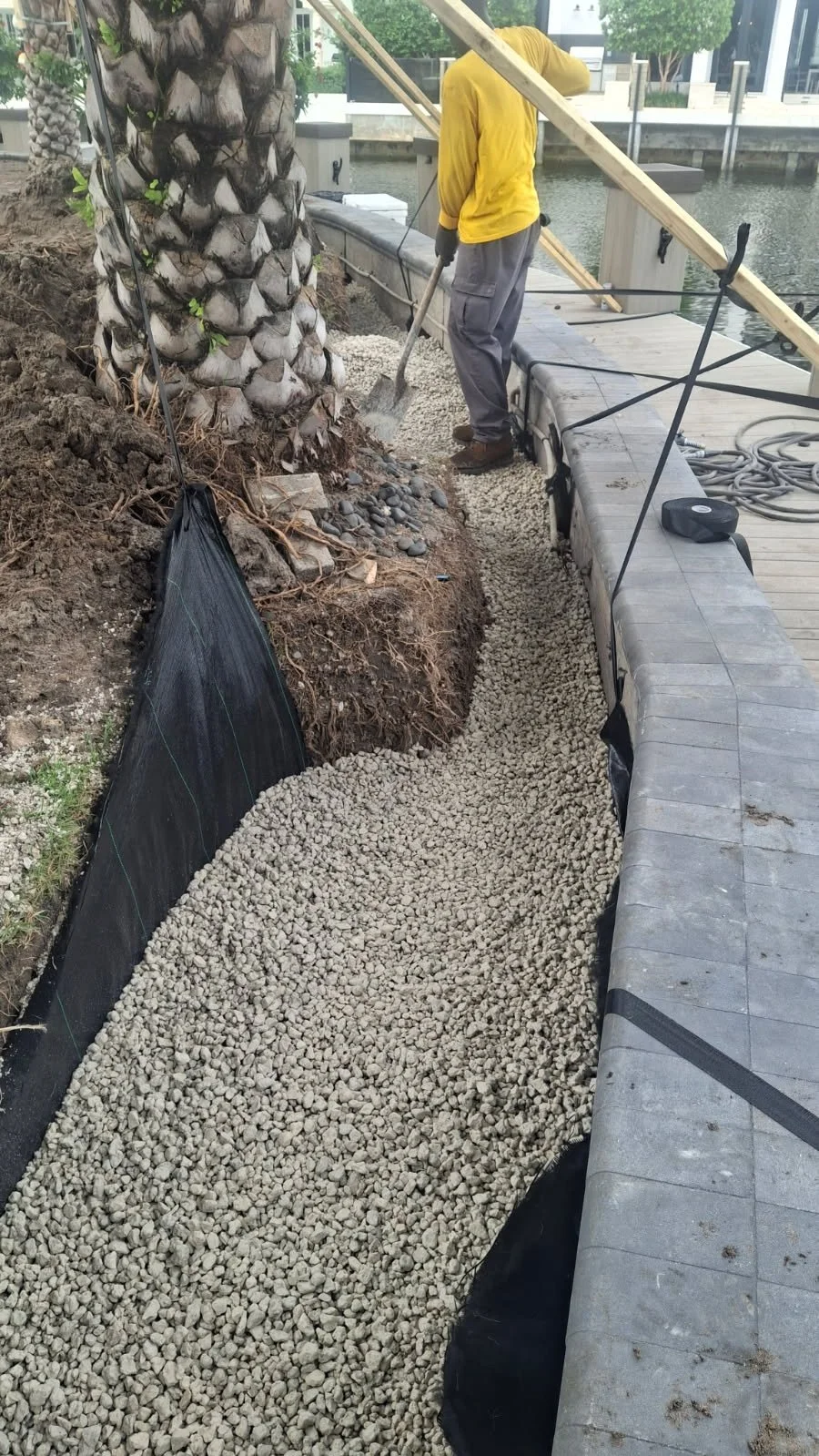 Rock barrier installation by Alligator Landscaping.JPG
