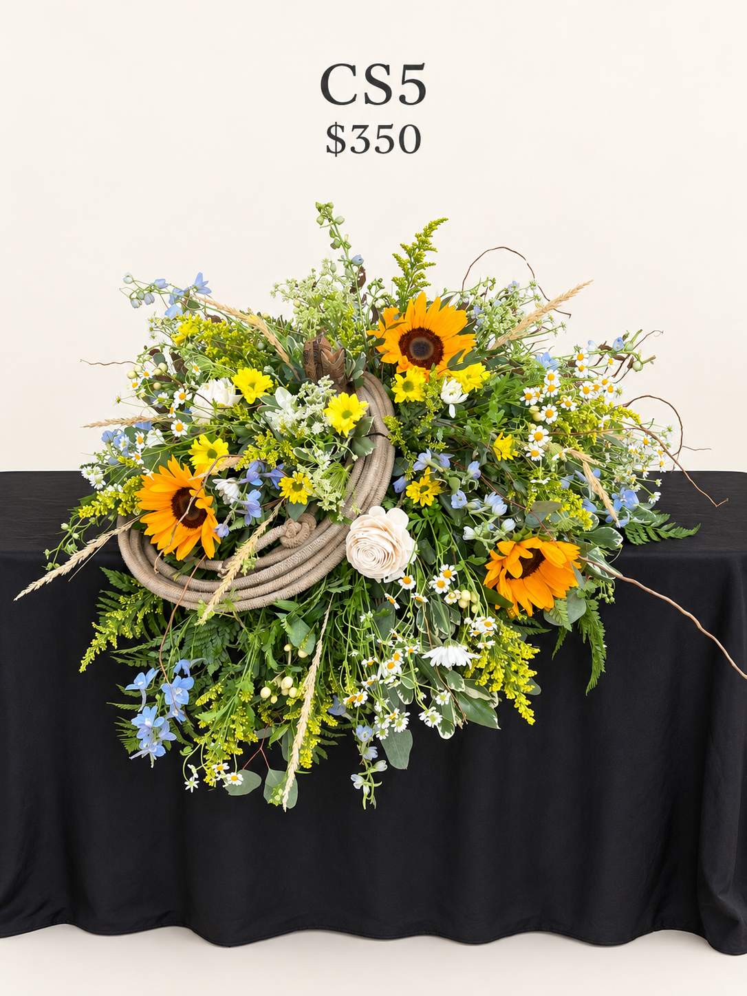 Rustic sunflower casket spray.png