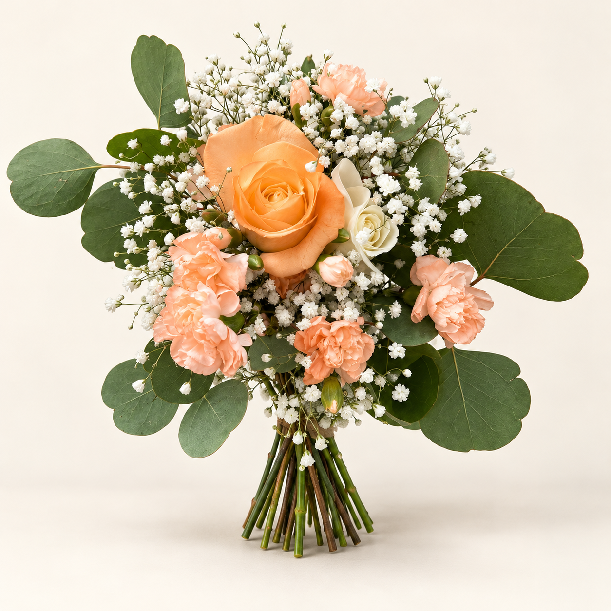 Warm peach bouquet with eucalyptus.png