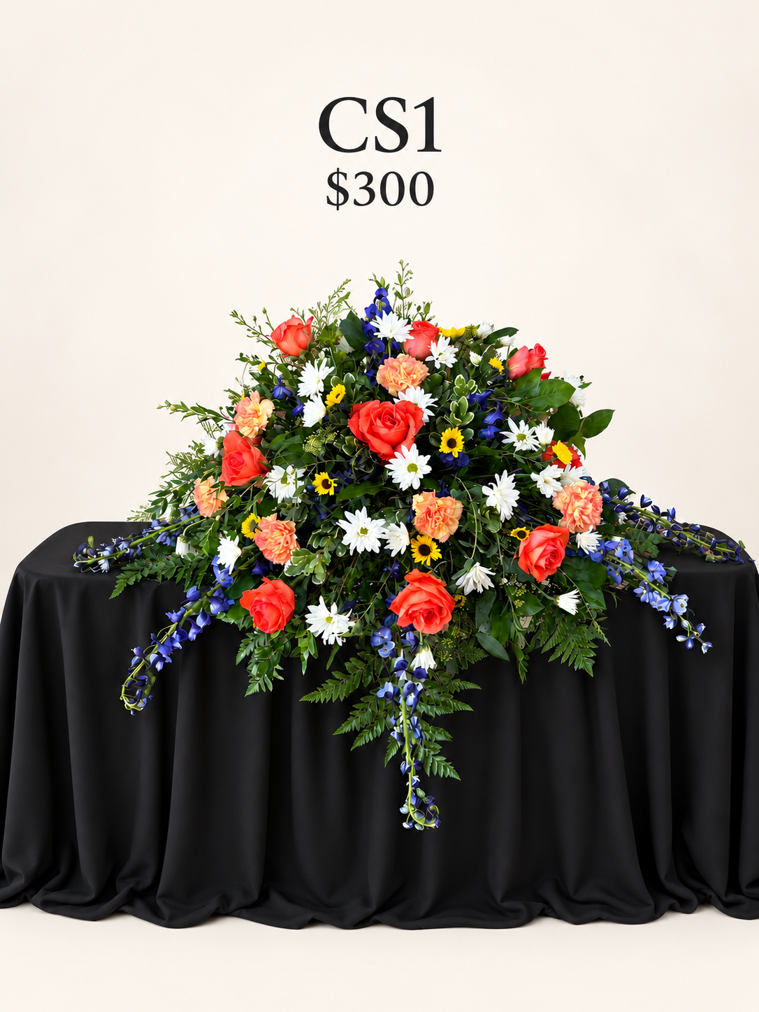 Ivory studio floral casket spray.png