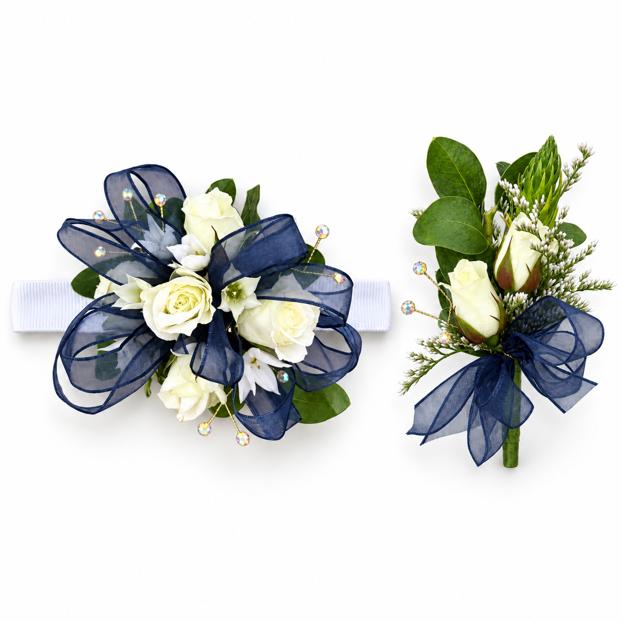 Matching ivory corsage and boutonniere.png