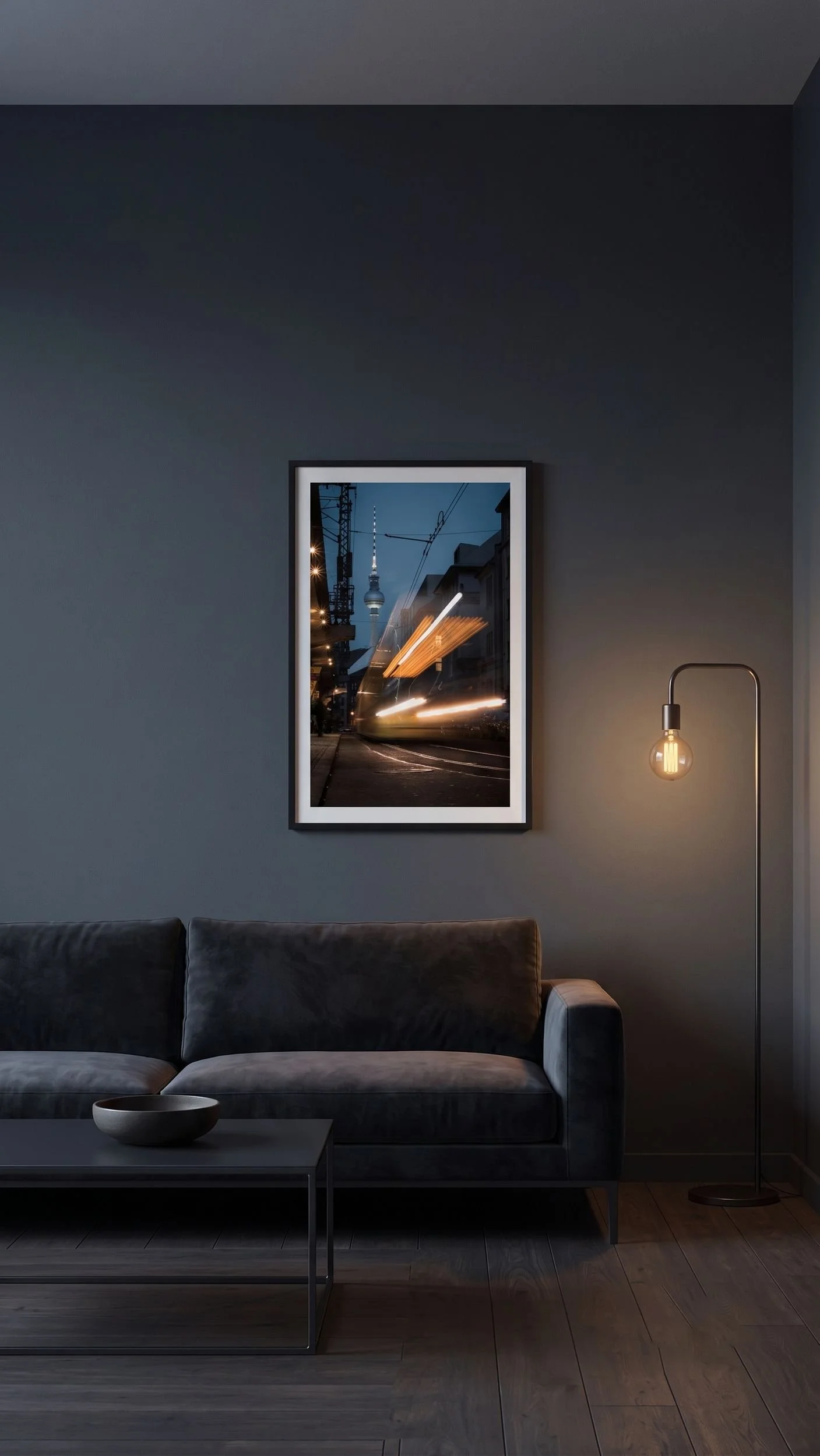 Fernsehturm night print leaning on a shelf in a dark interior.