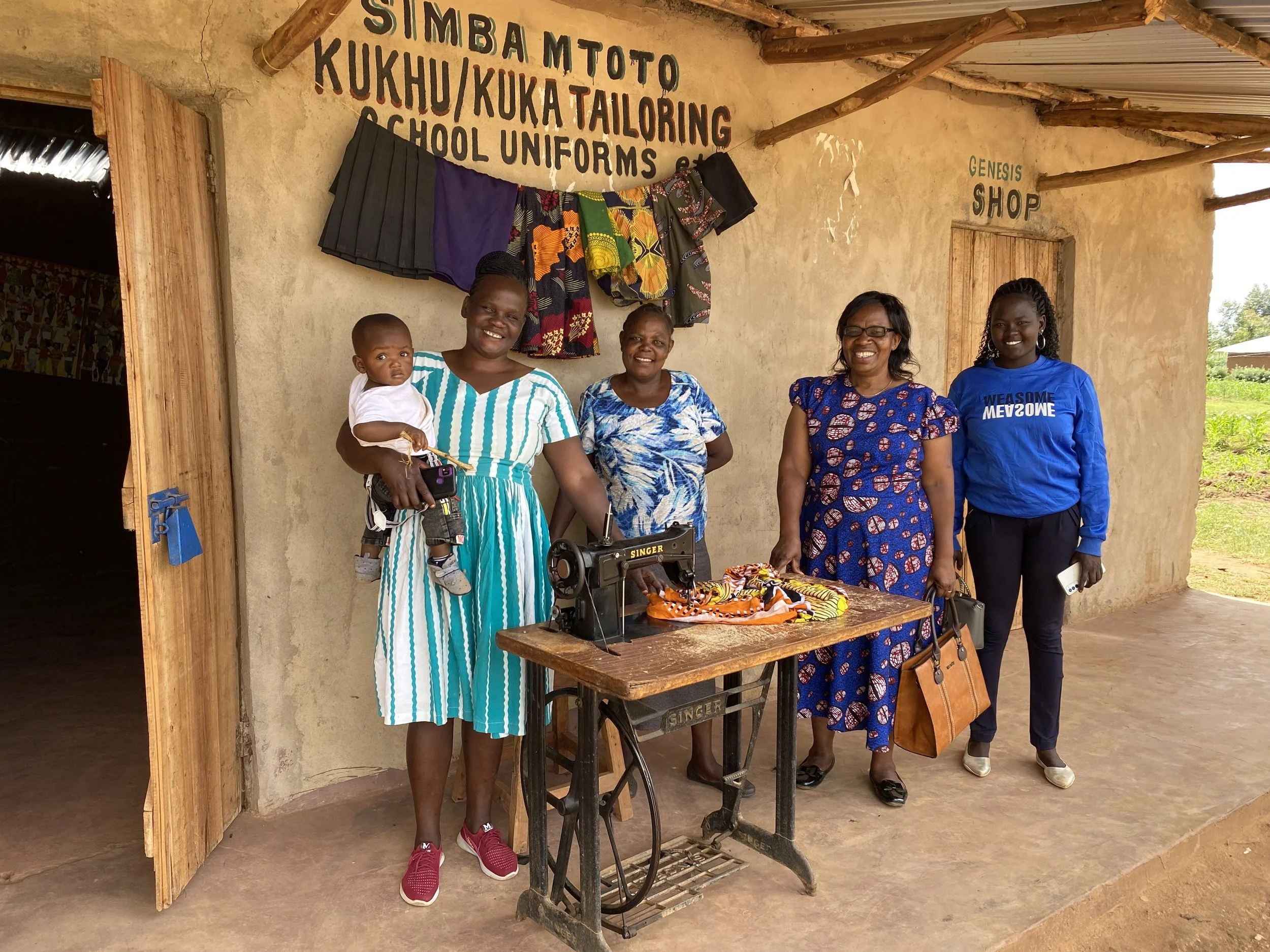 Rose Muuyi front of shop.jpg