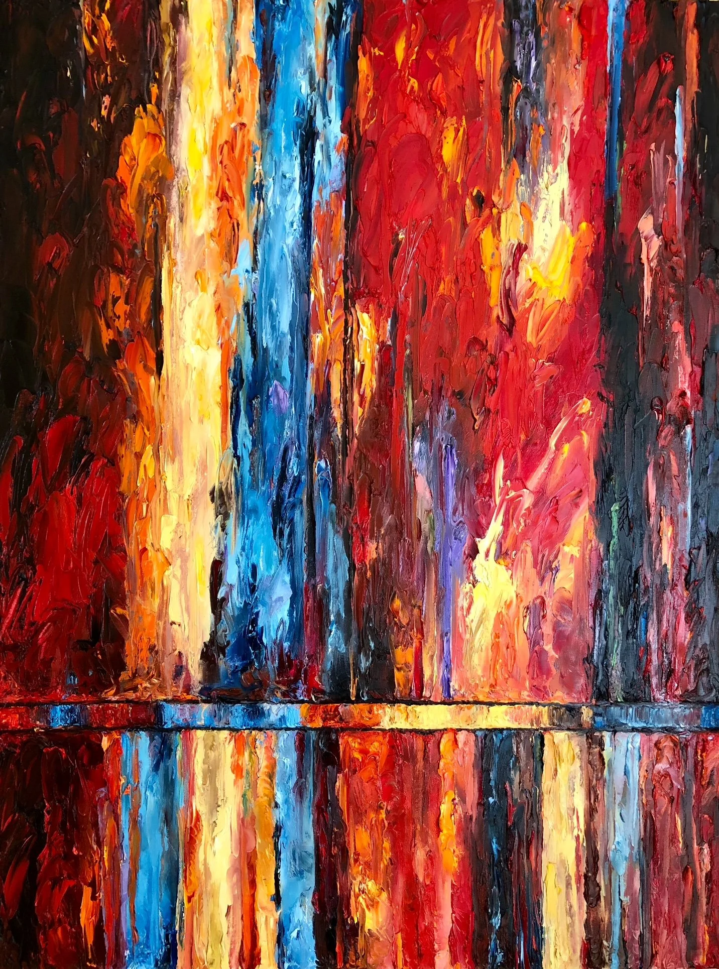 Abstract colorful painting with vertical streaks of red, yellow, blue, and orange, reflecting on a mirror surface.